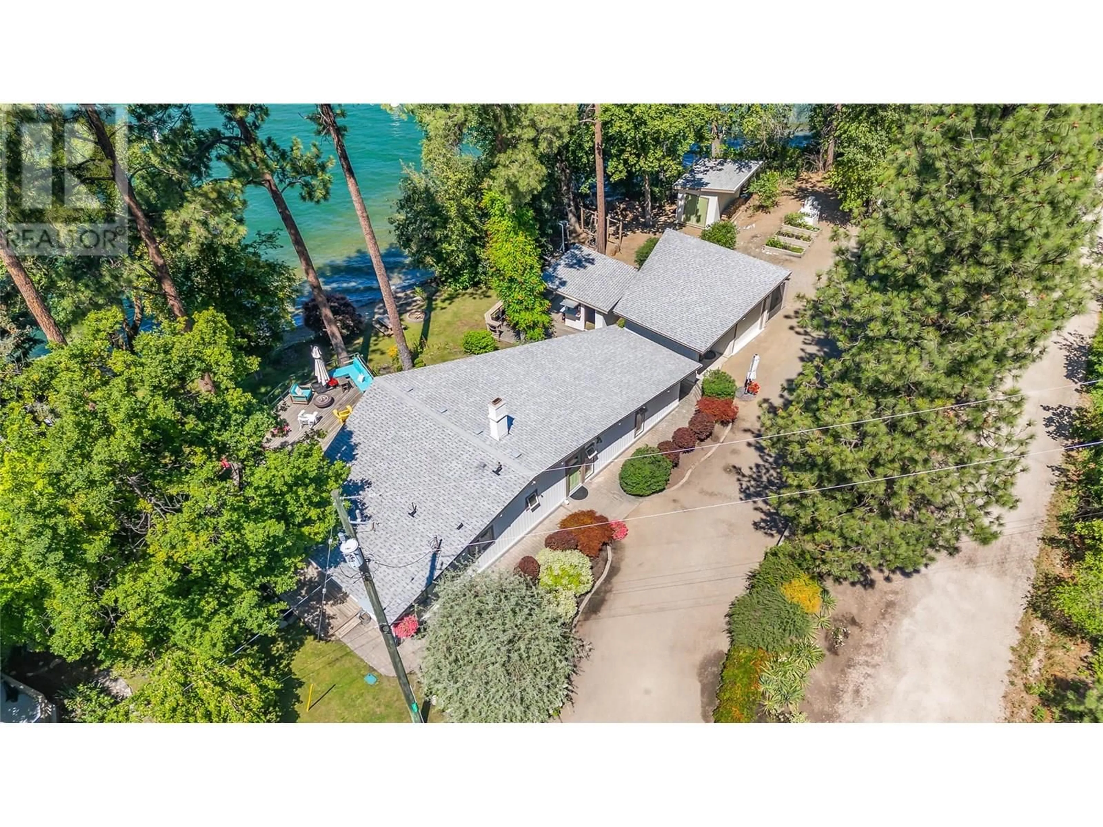 A pic from outside/outdoor area/front of a property/back of a property/a pic from drone, water/lake/river/ocean view for 12110 TREWHITT ROAD WEST, Lake Country British Columbia V4V2A6