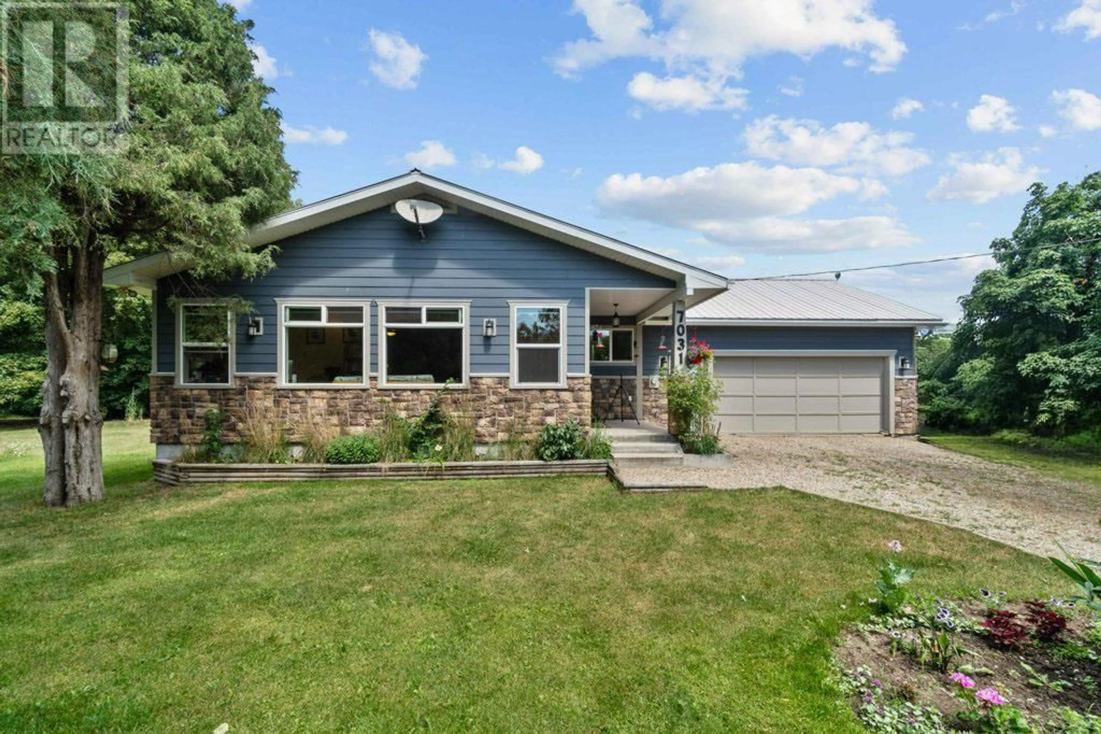 Home with vinyl exterior material, street for 7031 50 AVENUE SOUTHWEST, Salmon Arm British Columbia V1E3C4