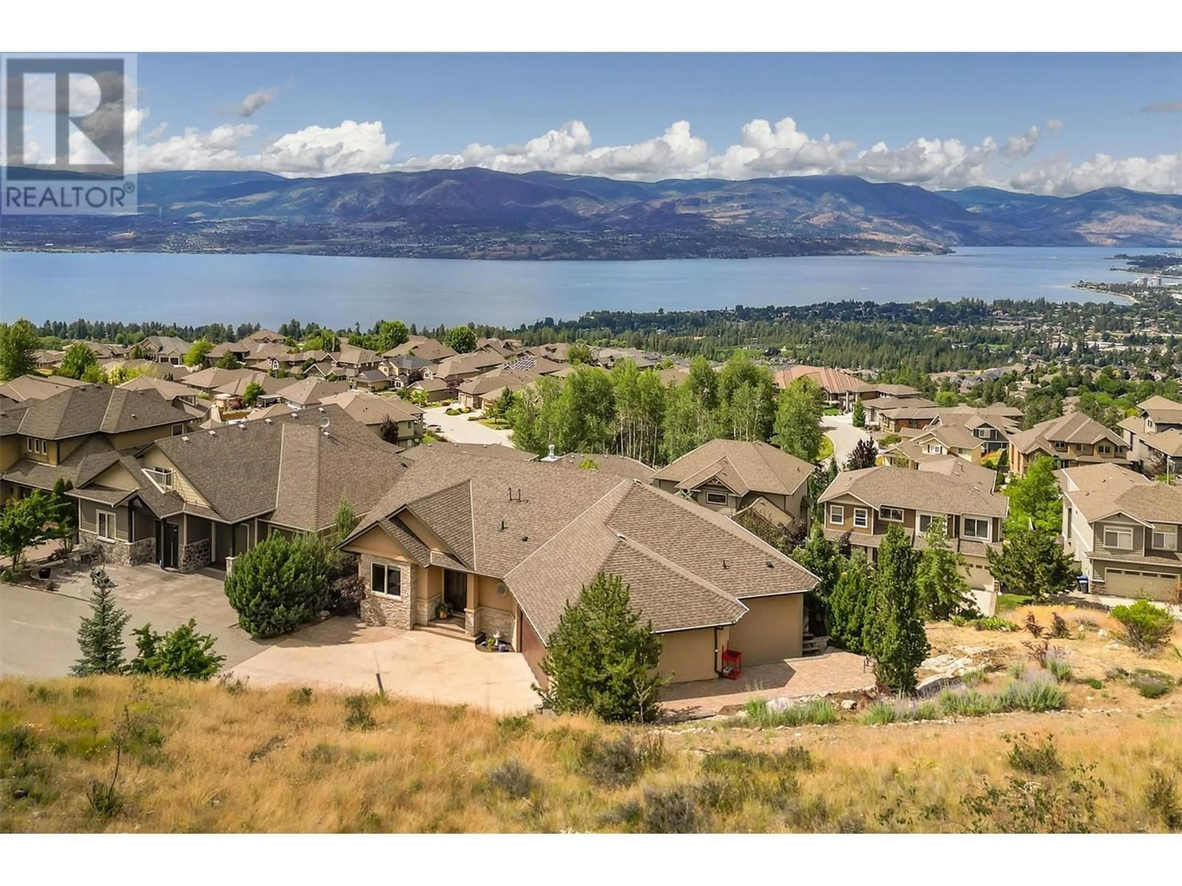 A pic from outside/outdoor area/front of a property/back of a property/a pic from drone, mountain view for 764 KUIPERS CRESCENT, Kelowna British Columbia V1W5C9