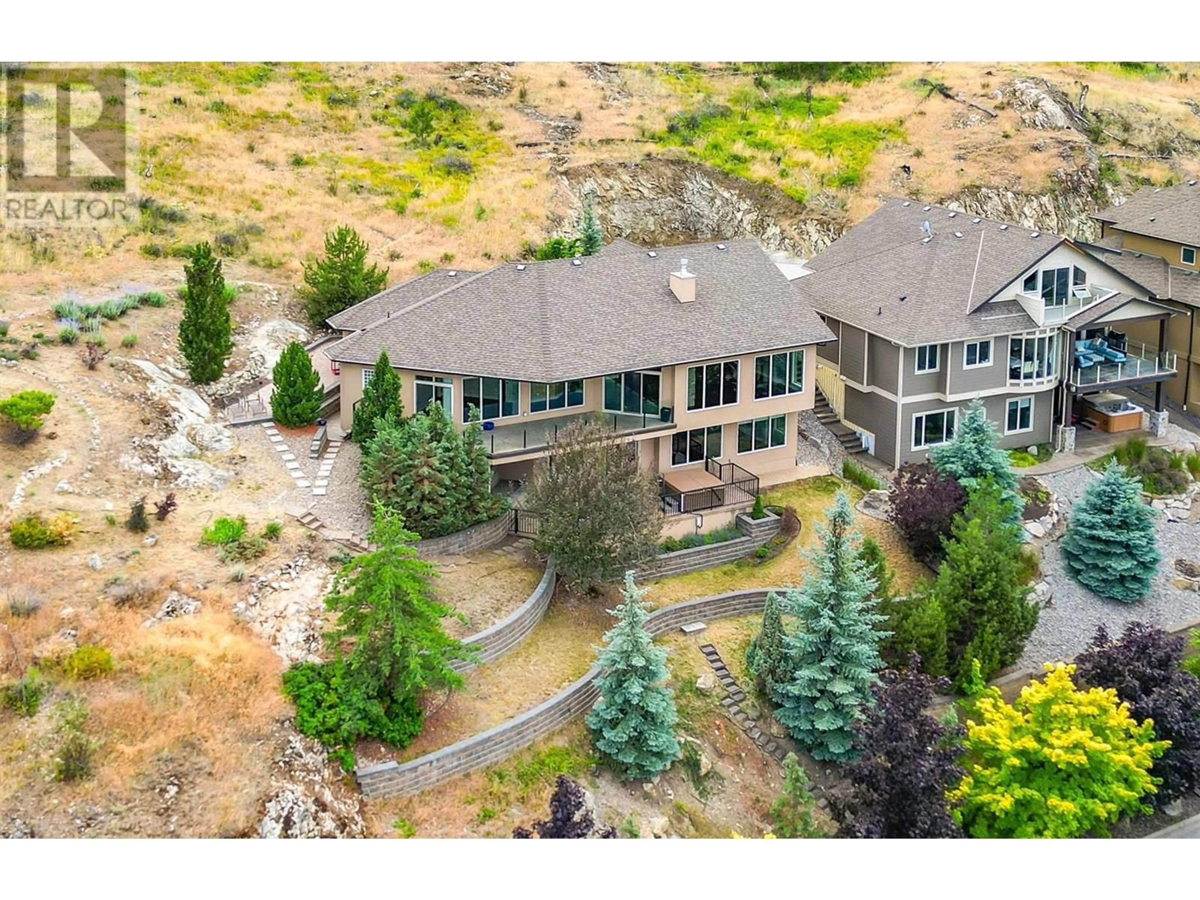 A pic from outside/outdoor area/front of a property/back of a property/a pic from drone, mountain view for 764 KUIPERS CRESCENT, Kelowna British Columbia V1W5C9