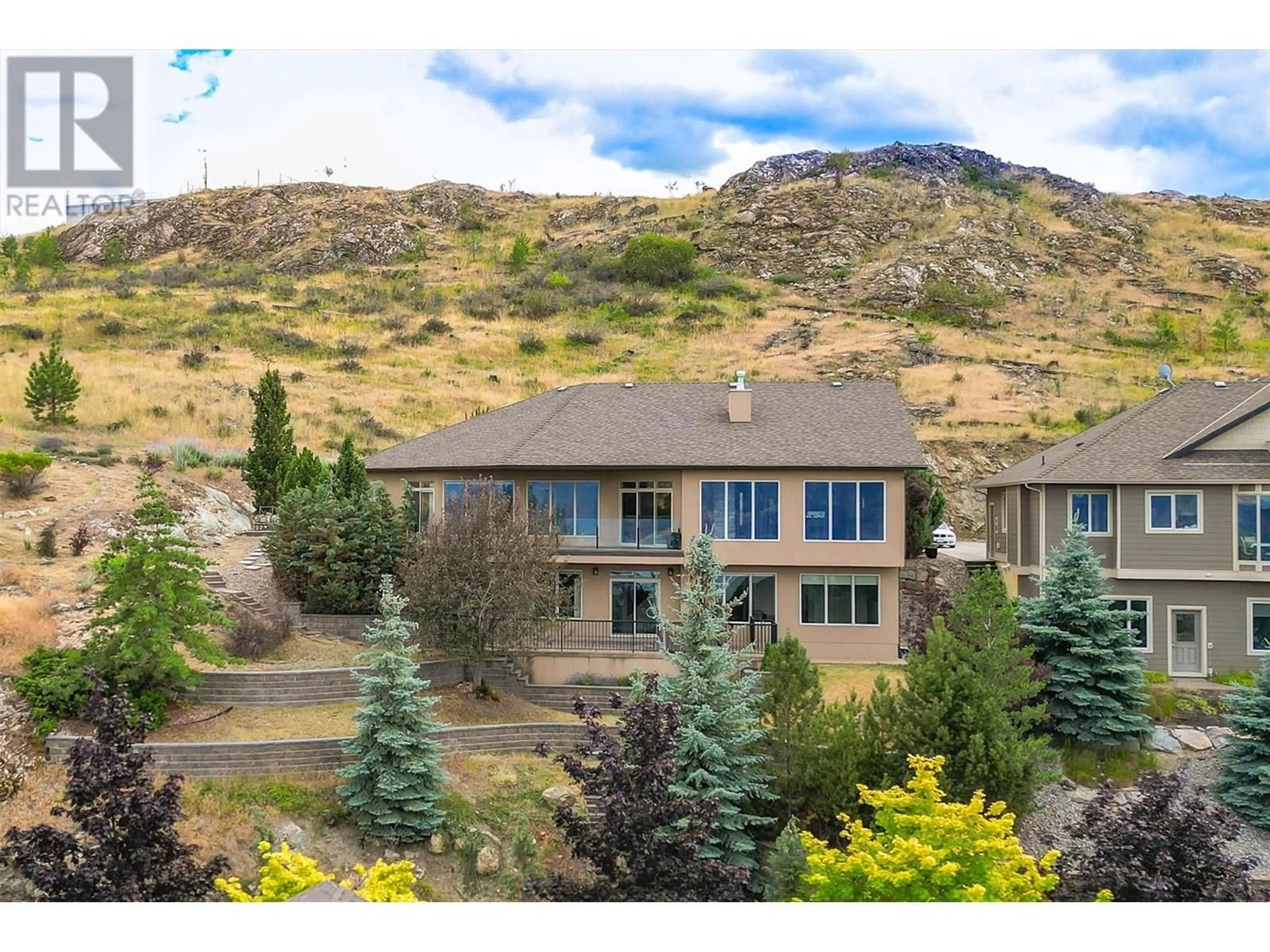 A pic from outside/outdoor area/front of a property/back of a property/a pic from drone, mountain view for 764 KUIPERS CRESCENT, Kelowna British Columbia V1W5C9