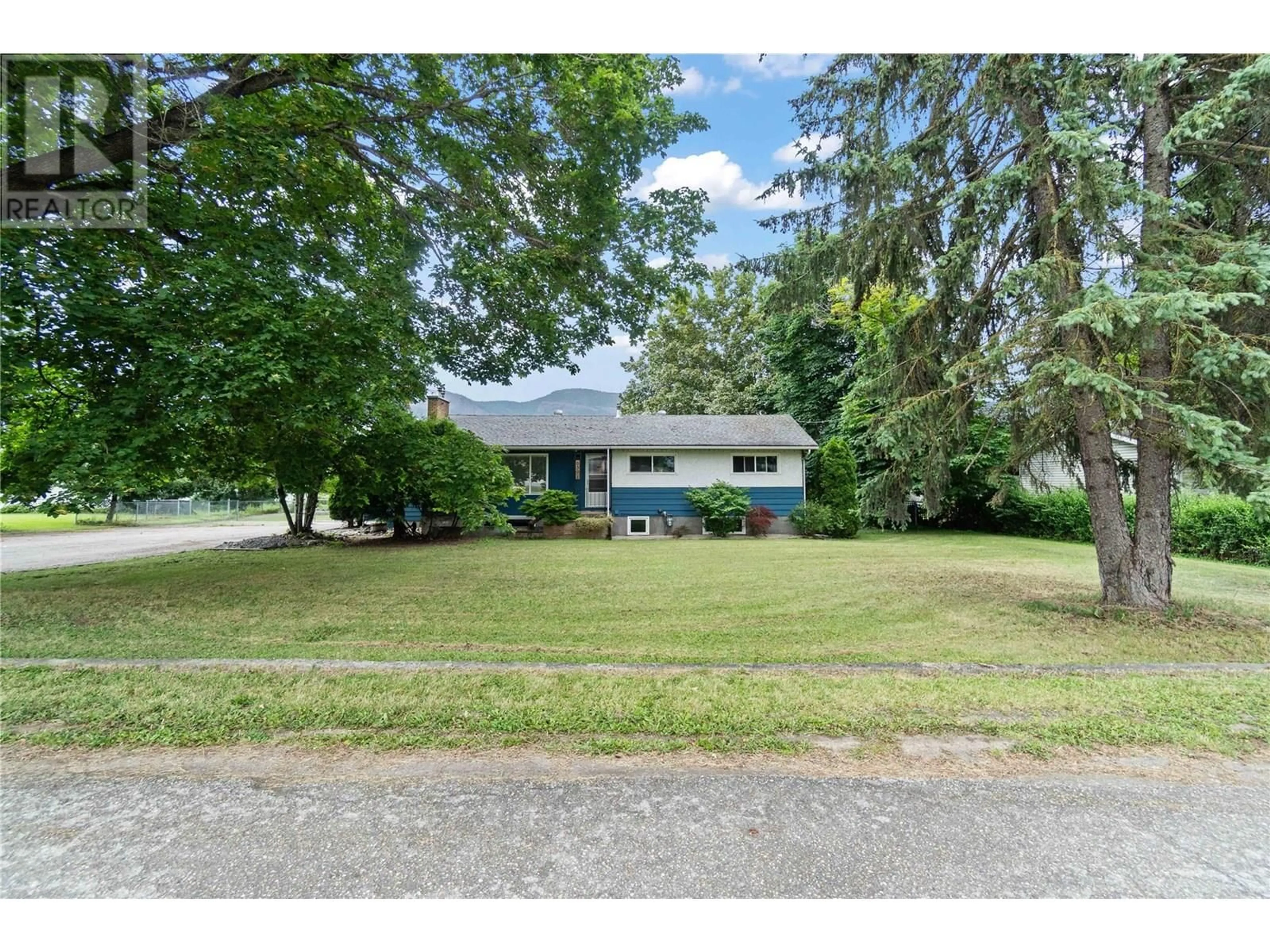 A pic from outside/outdoor area/front of a property/back of a property/a pic from drone, street for 6591 97A HIGHWAY, Enderby British Columbia V0E1V3