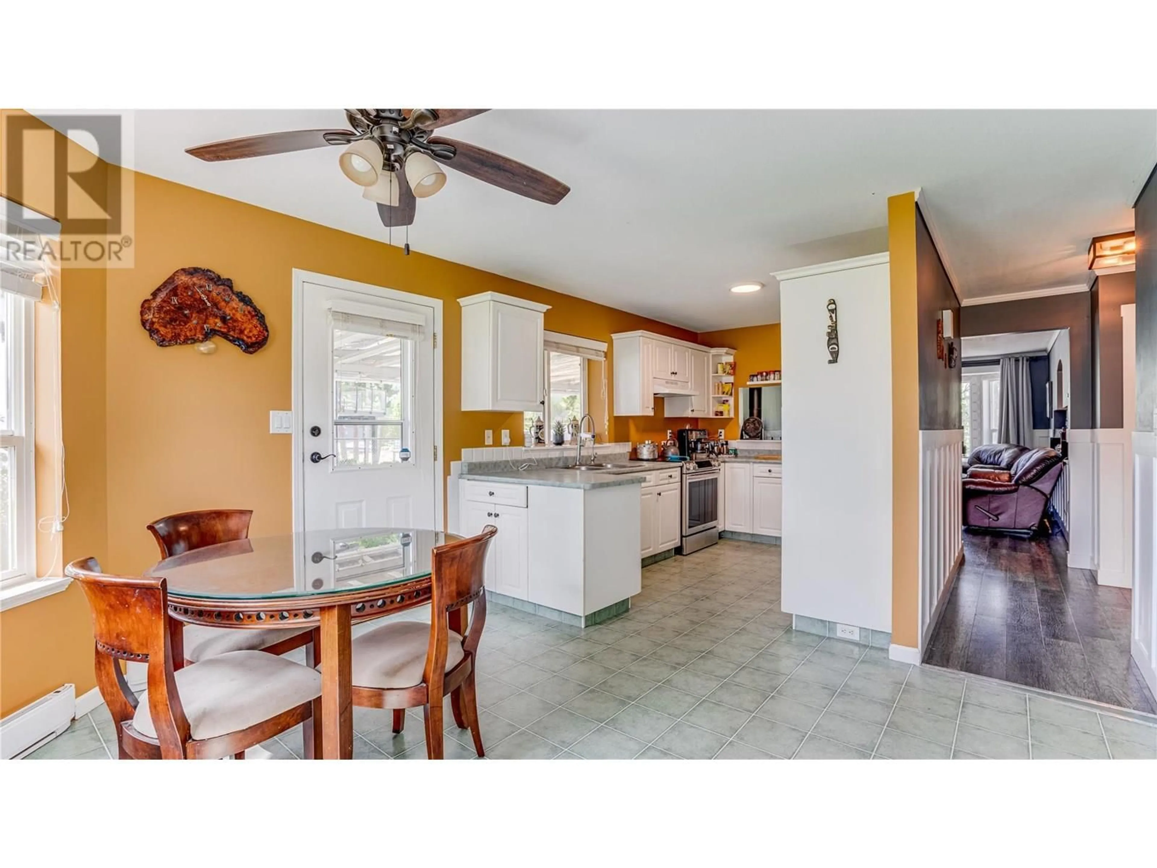 Open concept kitchen, ceramic/tile floor for 7204 DUNWATERS ROAD, Kelowna British Columbia V1Z3W5