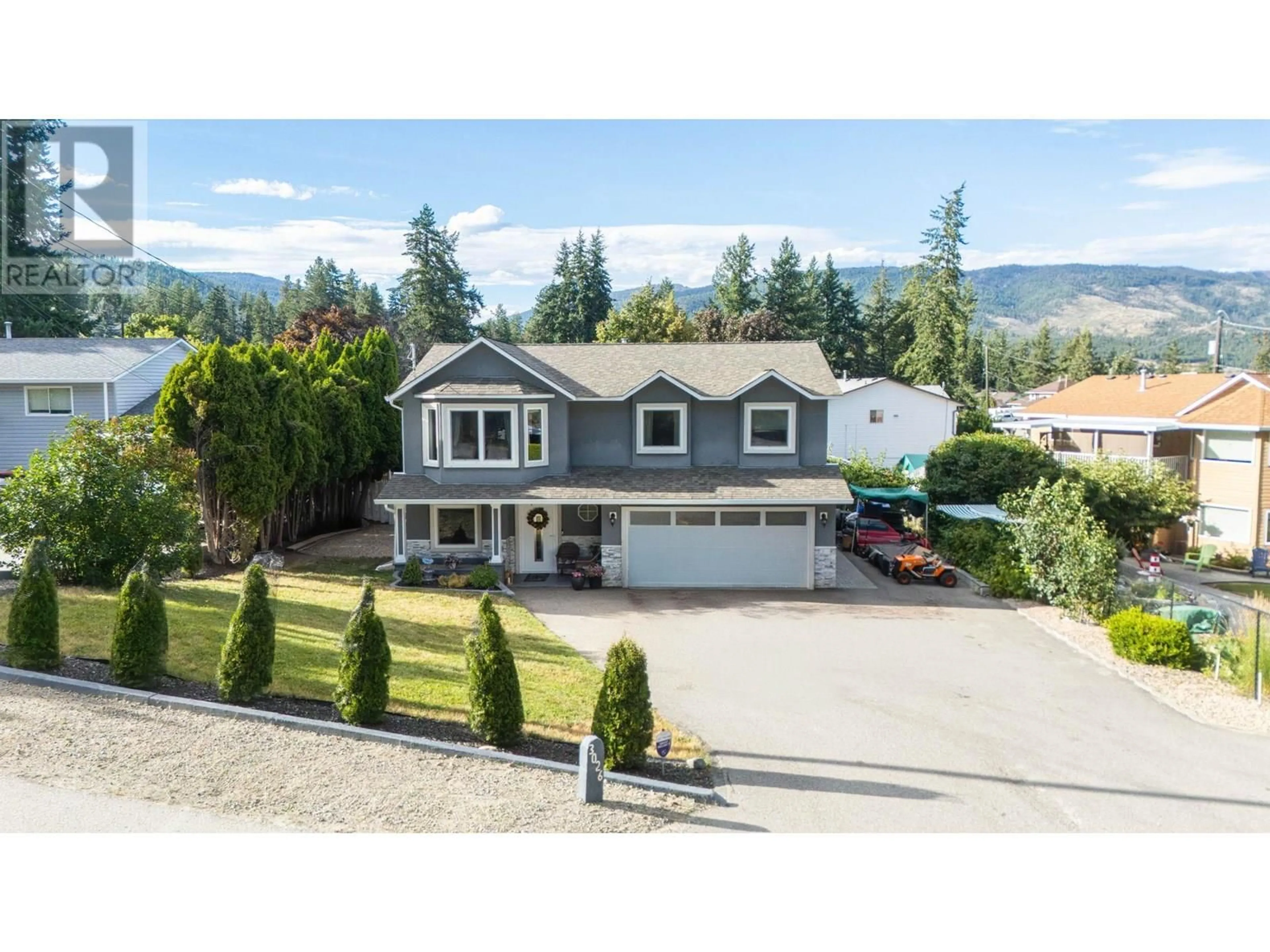 A pic from outside/outdoor area/front of a property/back of a property/a pic from drone, mountain view for 3026 MCIVER ROAD, West Kelowna British Columbia V4T1C6