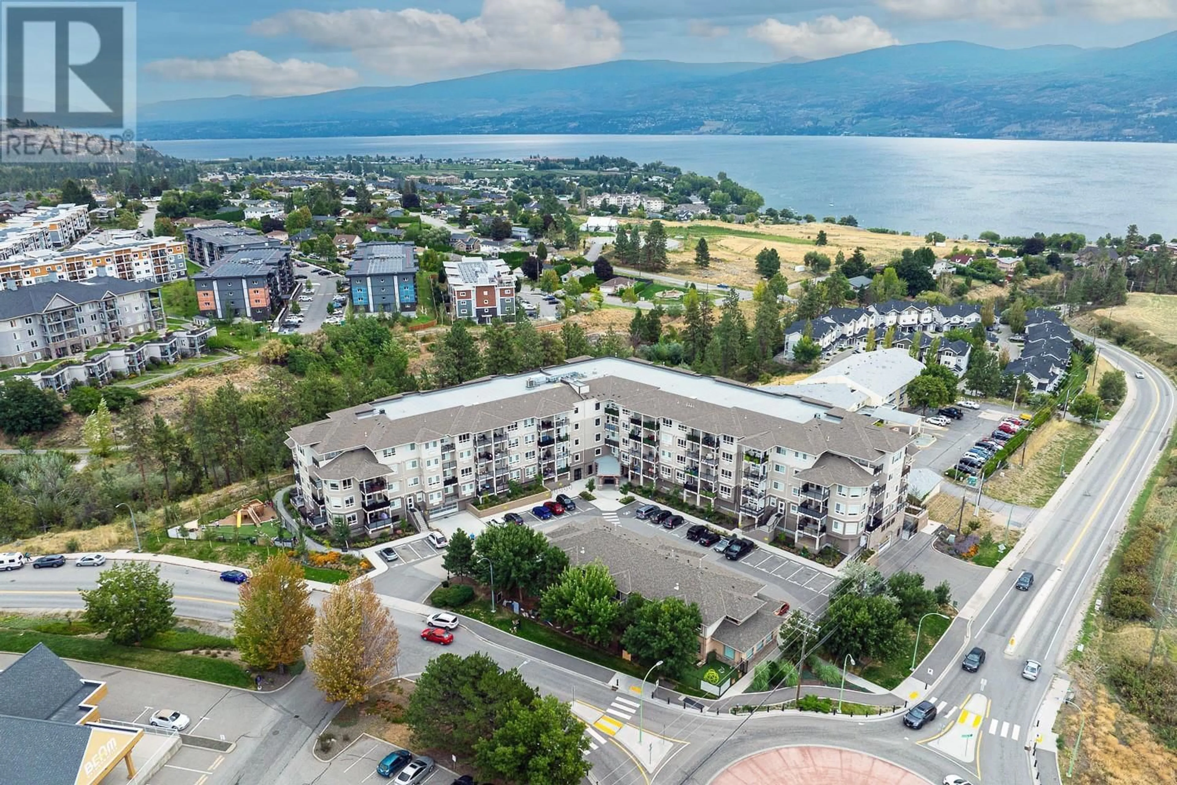 A pic from outside/outdoor area/front of a property/back of a property/a pic from drone, mountain view for 105 - 2301 CARRINGTON ROAD, West Kelowna British Columbia V4T0E2