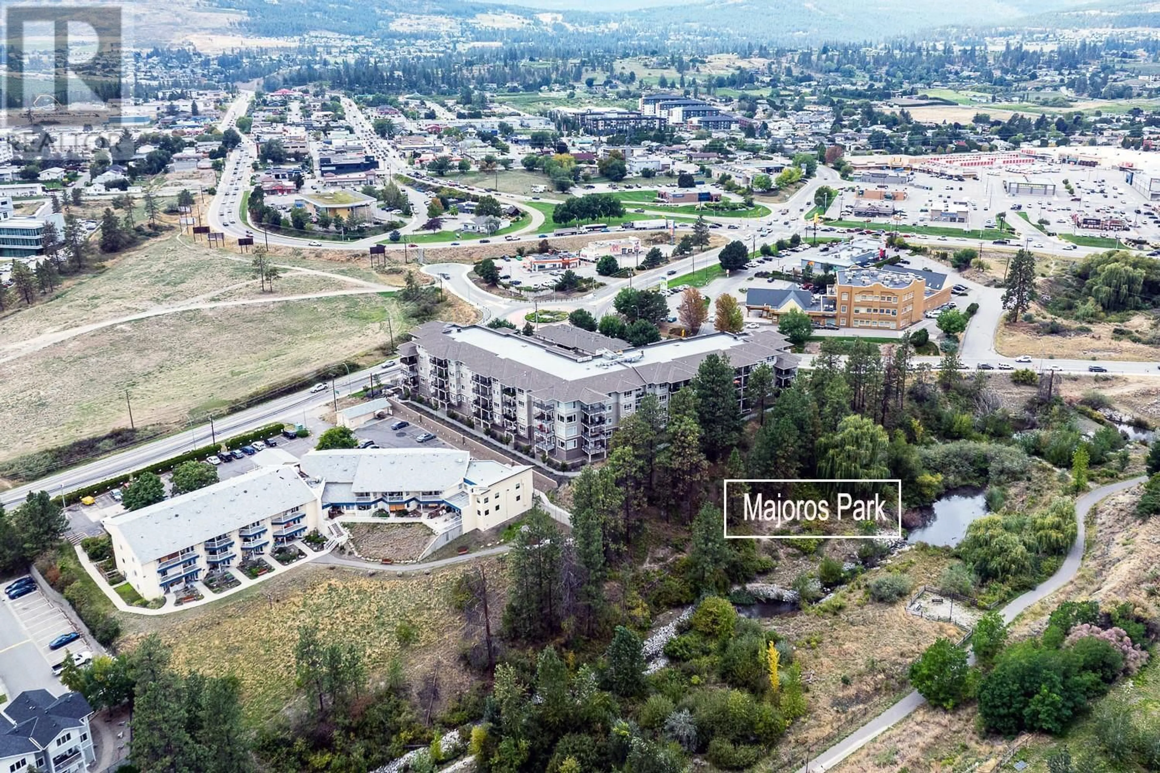 A pic from outside/outdoor area/front of a property/back of a property/a pic from drone, mountain view for 105 - 2301 CARRINGTON ROAD, West Kelowna British Columbia V4T0E2
