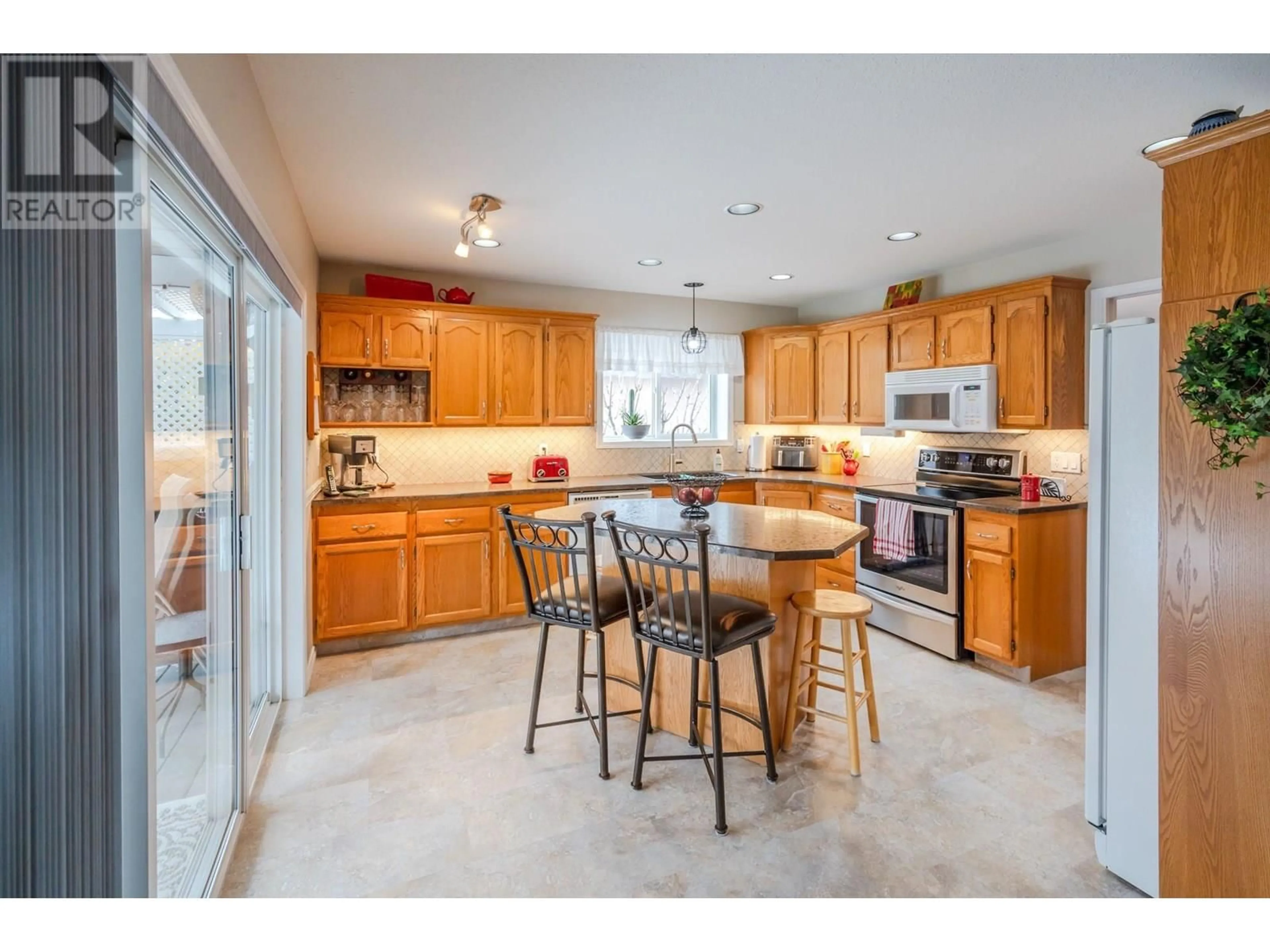 Open concept kitchen, ceramic/tile floor for 445 RIDGE PLACE, Penticton British Columbia V2A8N7