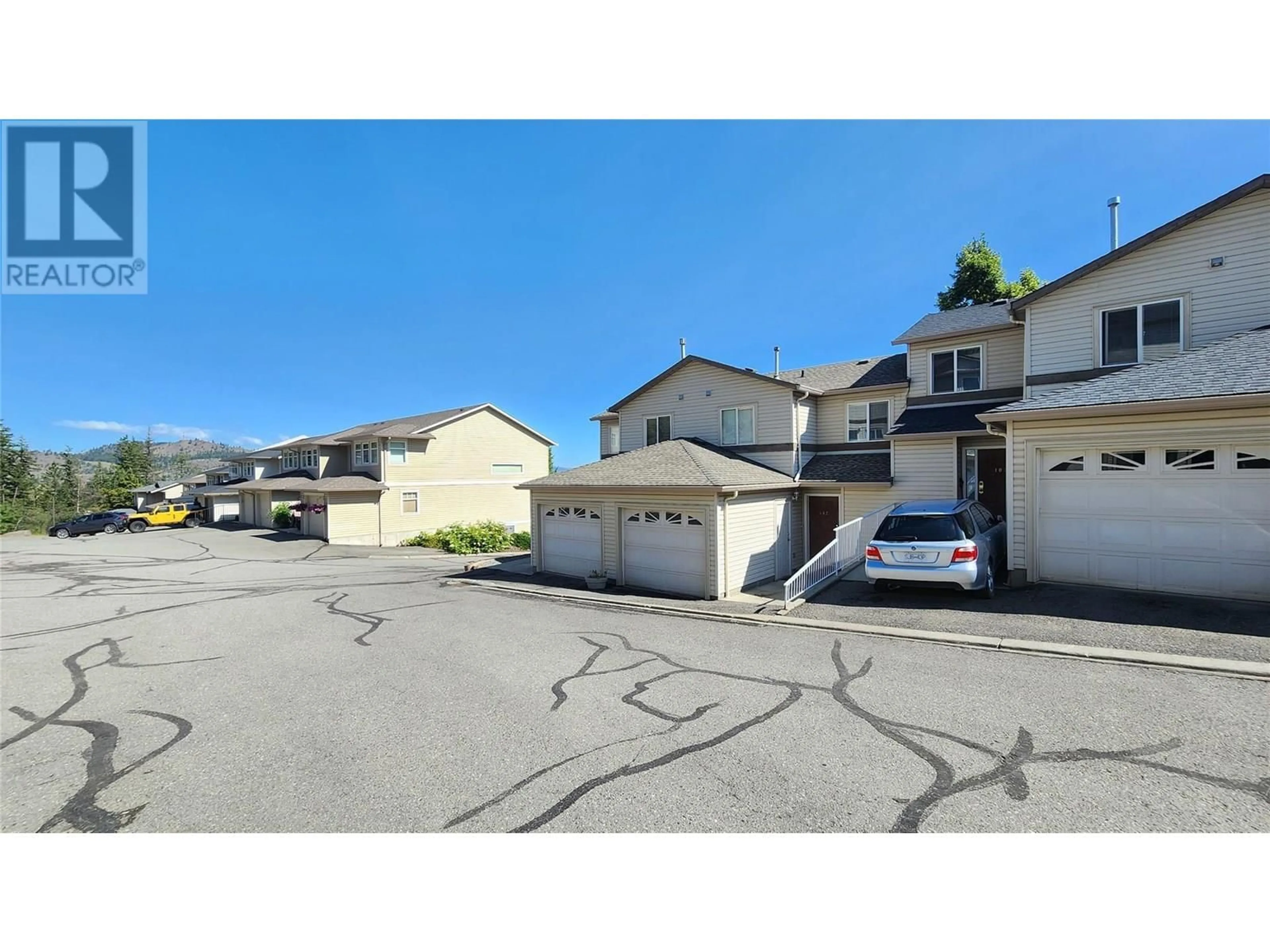 A pic from outside/outdoor area/front of a property/back of a property/a pic from drone, street for 102 - 1990 PACIFIC WAY, Kamloops British Columbia V1S1W3