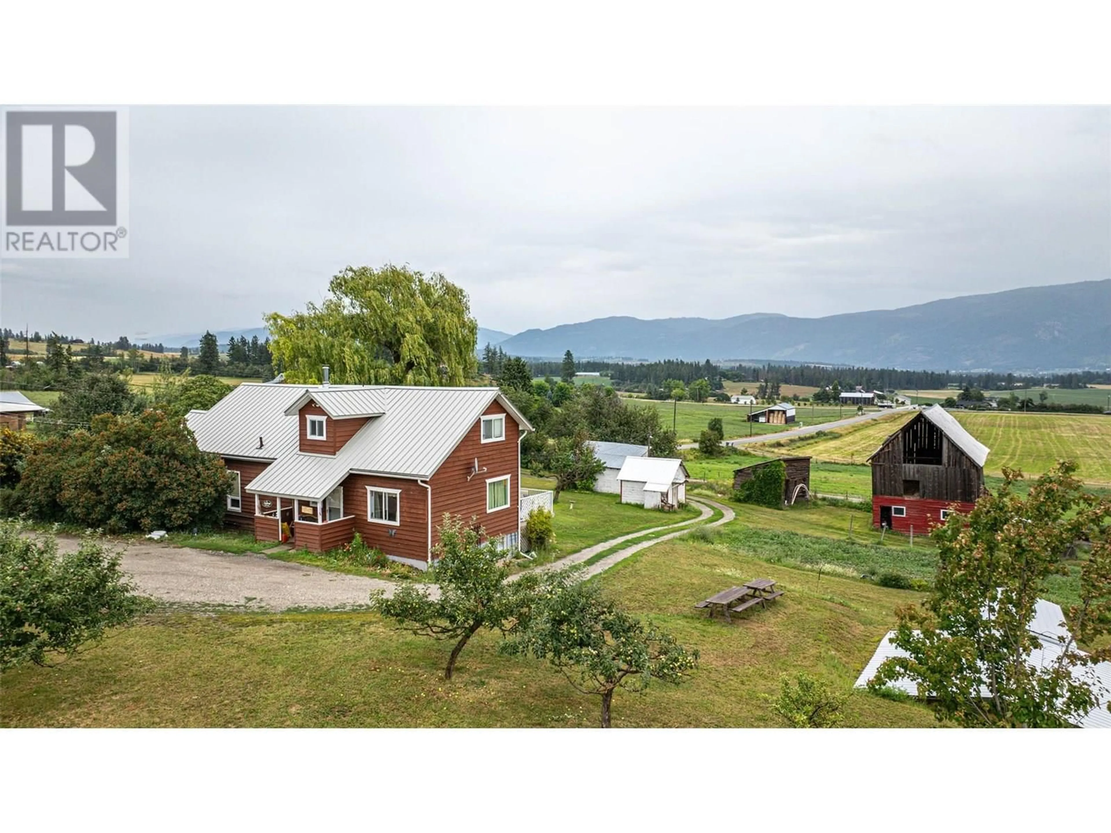 A pic from outside/outdoor area/front of a property/back of a property/a pic from drone, mountain view for 4377 HALLAM ROAD, Armstrong British Columbia V0E1B4