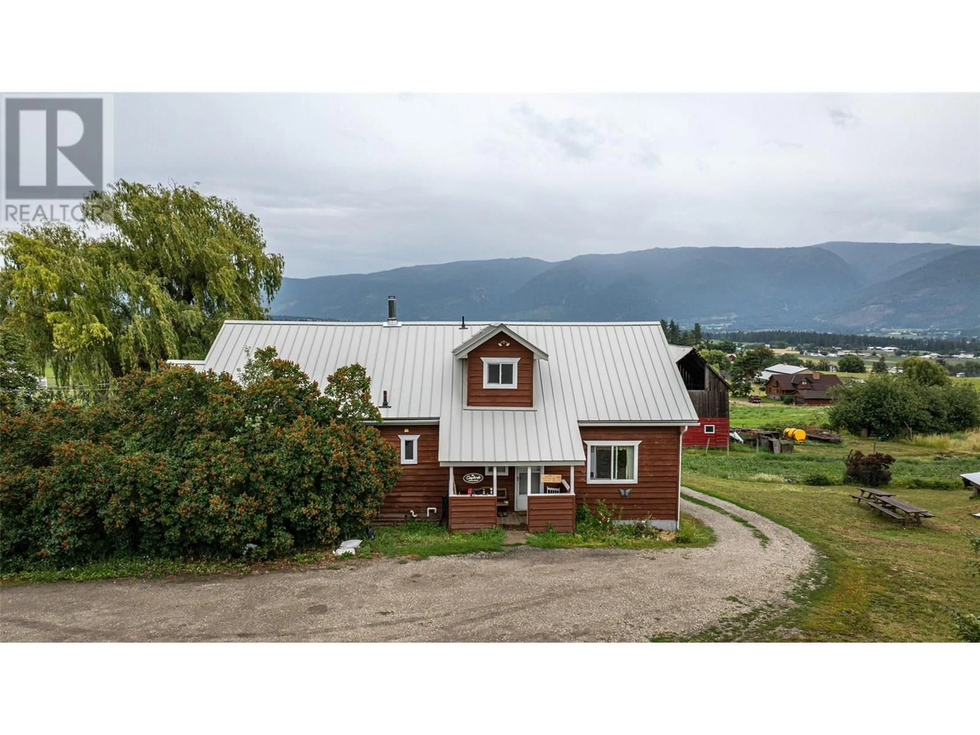 A pic from outside/outdoor area/front of a property/back of a property/a pic from drone, mountain view for 4377 HALLAM ROAD, Armstrong British Columbia V0E1B4