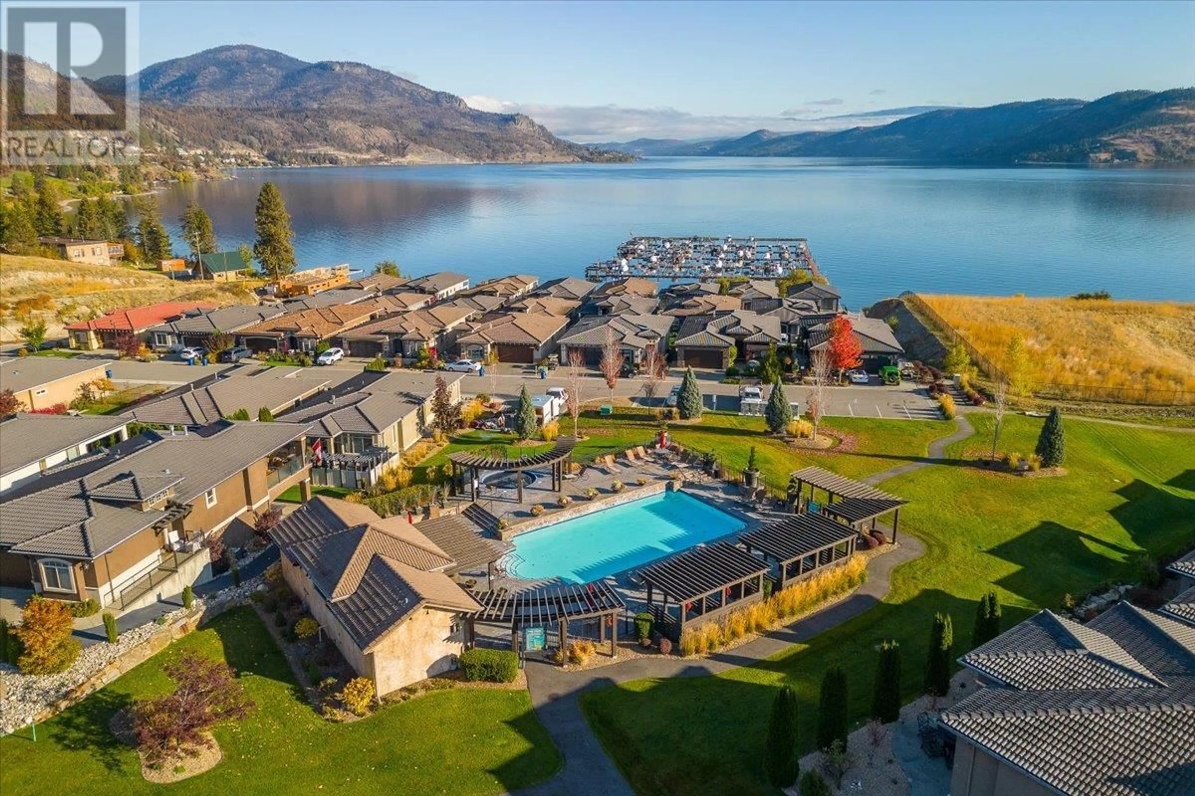 A pic from outside/outdoor area/front of a property/back of a property/a pic from drone, water/lake/river/ocean view for 1671 HARBOUR VIEW CRESCENT, Kelowna British Columbia V1Z4E1