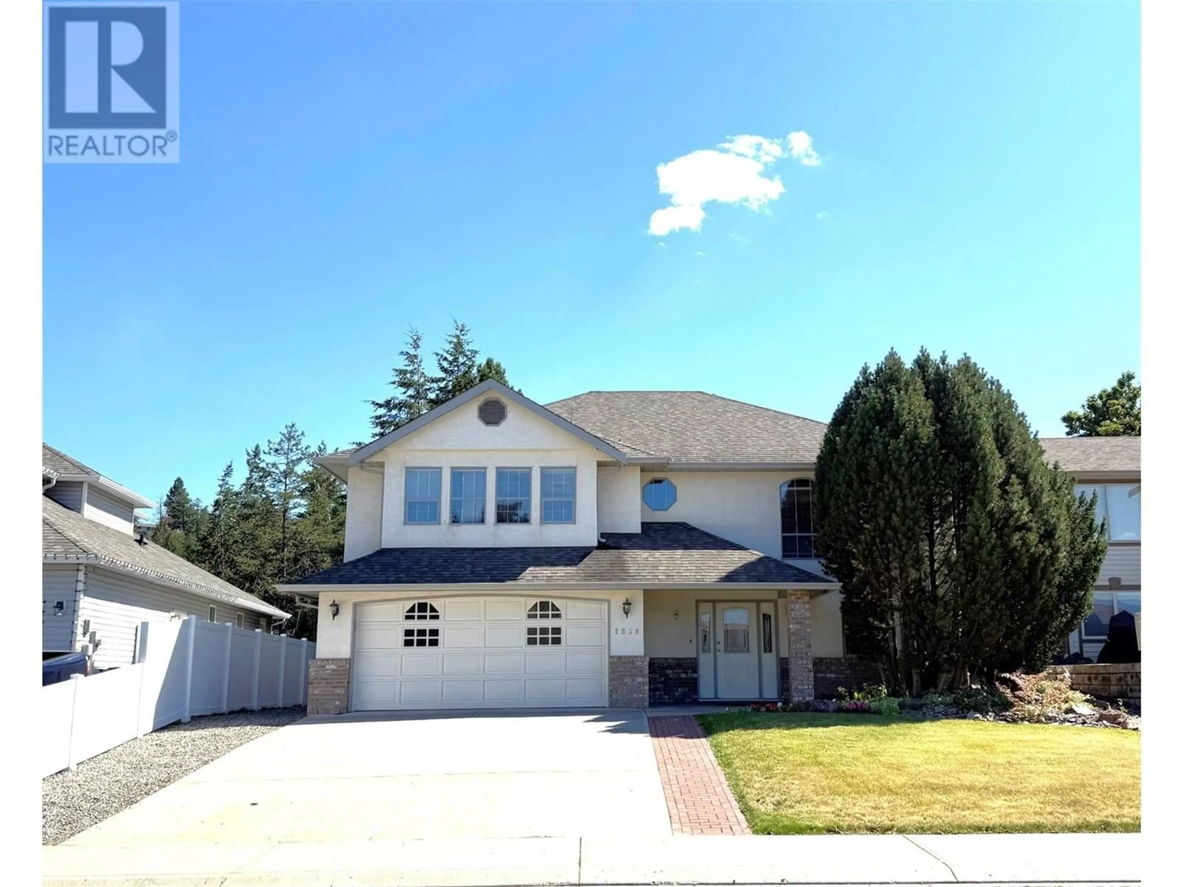 Home with vinyl exterior material, street for 1869 MCKINLEY COURT, Kamloops British Columbia V2E2L9