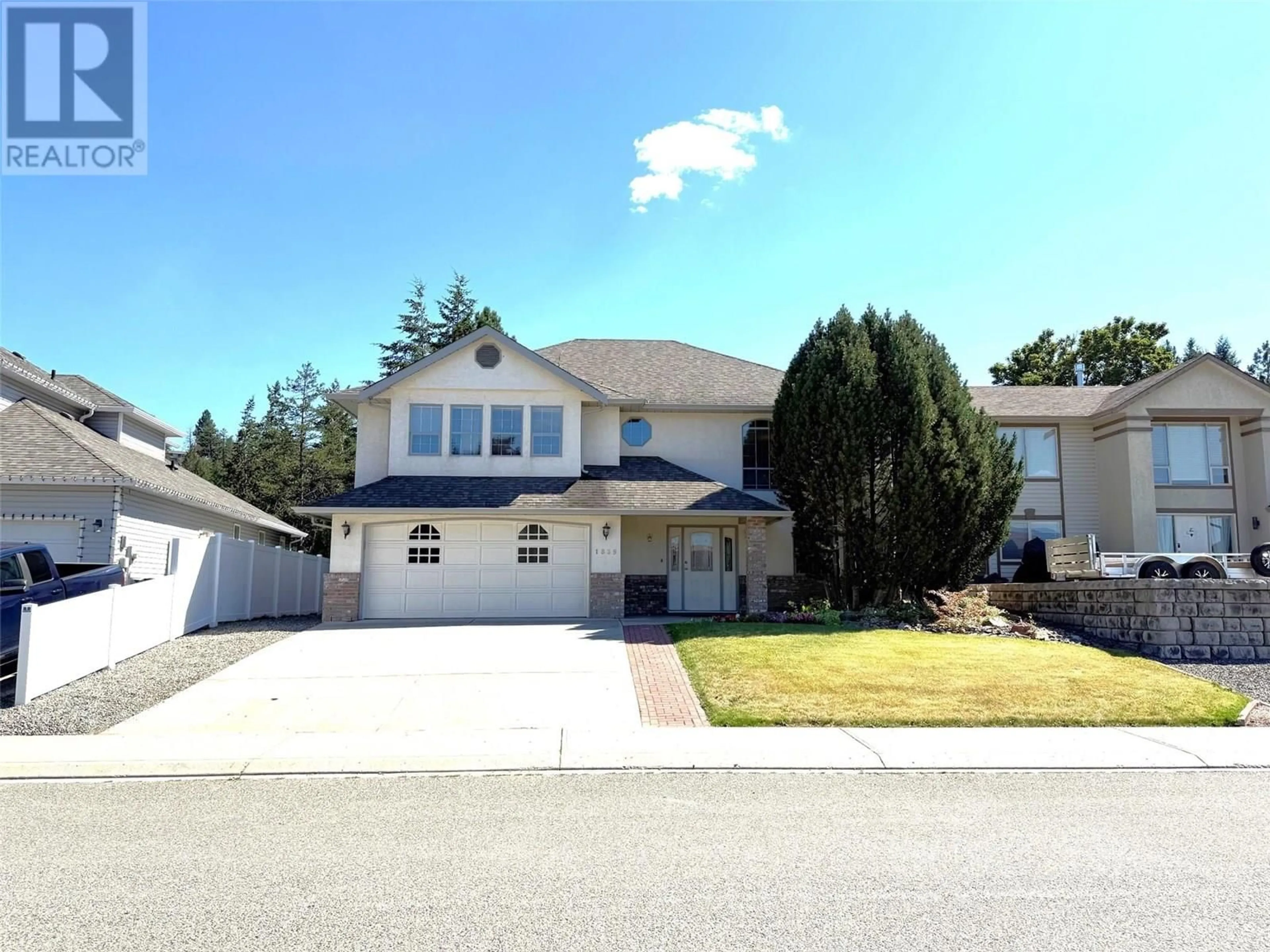 Home with vinyl exterior material, street for 1869 MCKINLEY COURT, Kamloops British Columbia V2E2L9