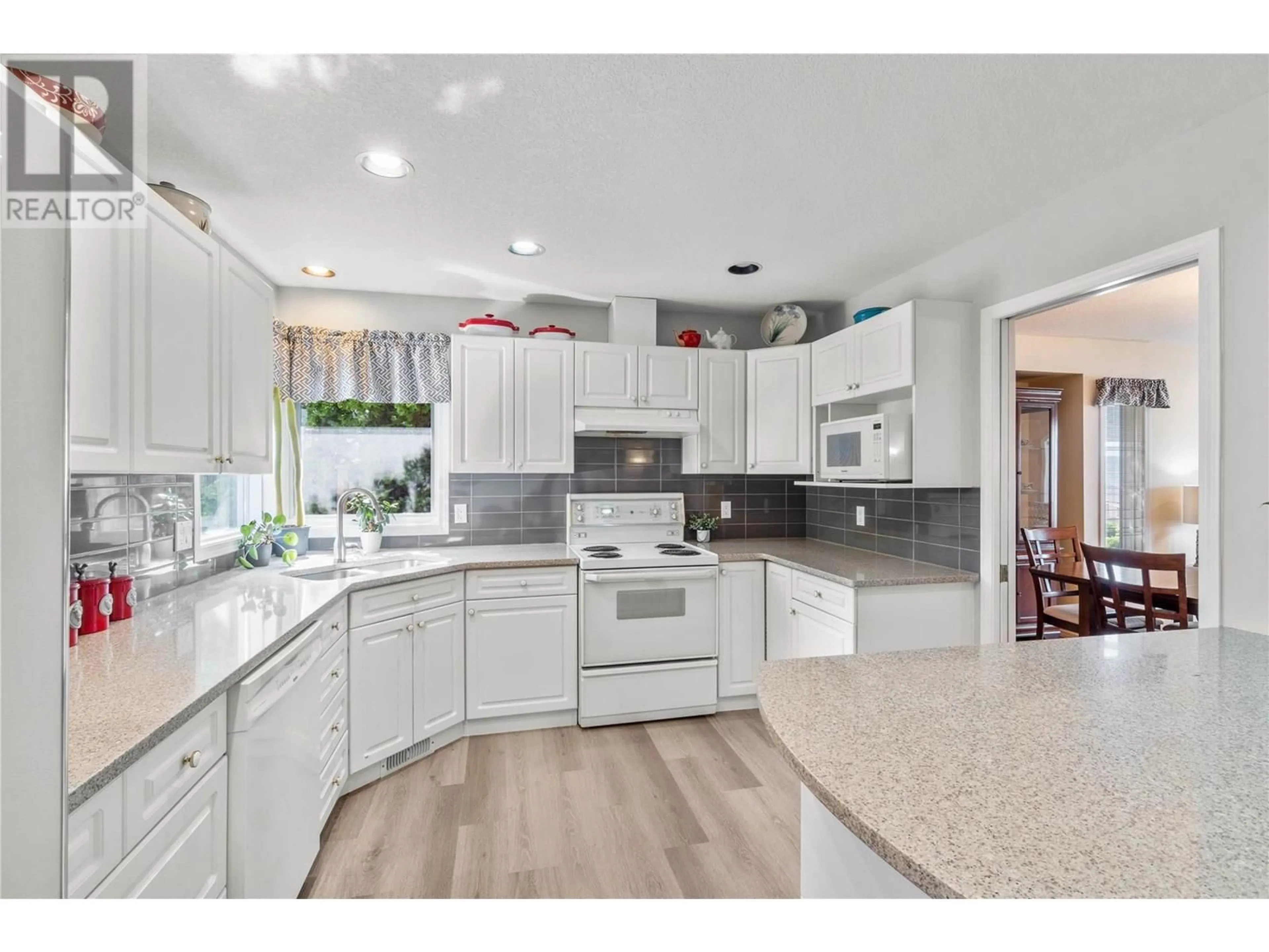 Open concept kitchen, ceramic/tile floor for 1869 MCKINLEY COURT, Kamloops British Columbia V2E2L9