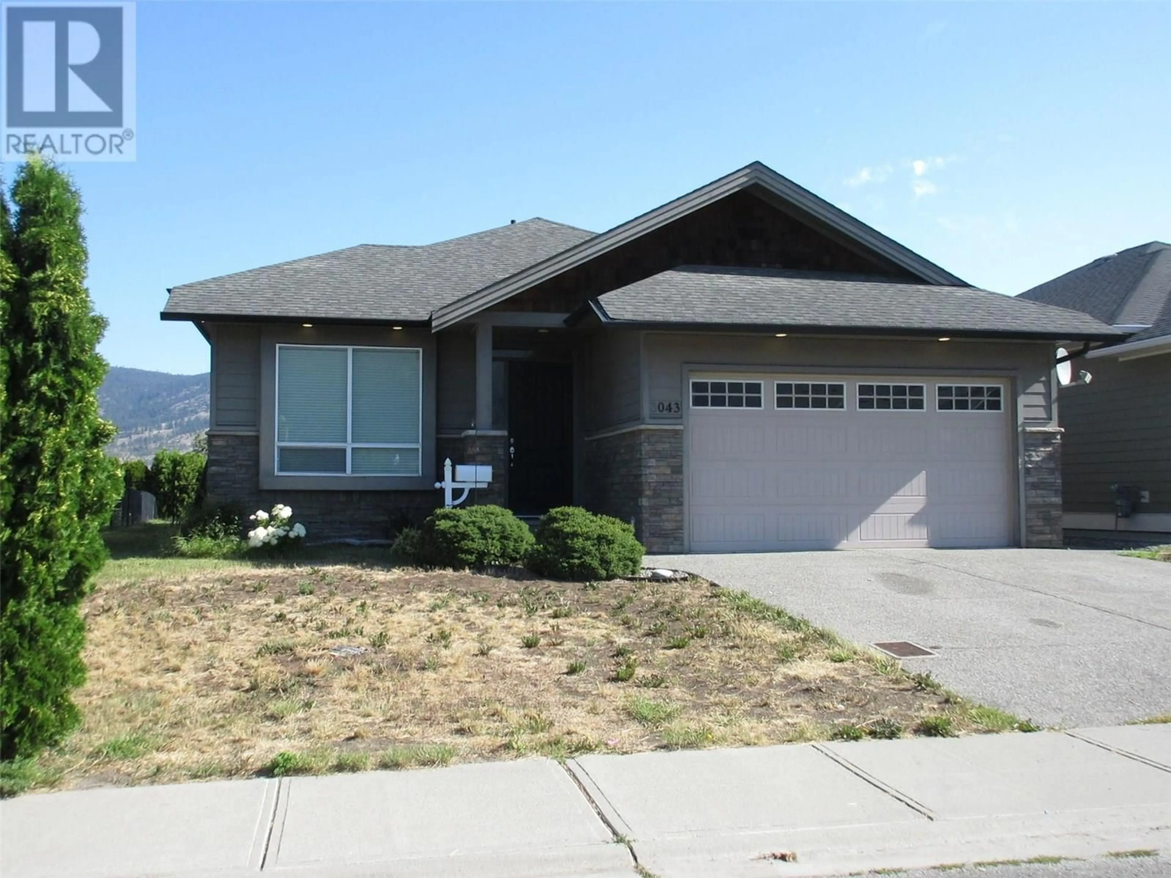 Home with vinyl exterior material, street for 3043 HILTON DRIVE, Merritt British Columbia V1K0B2