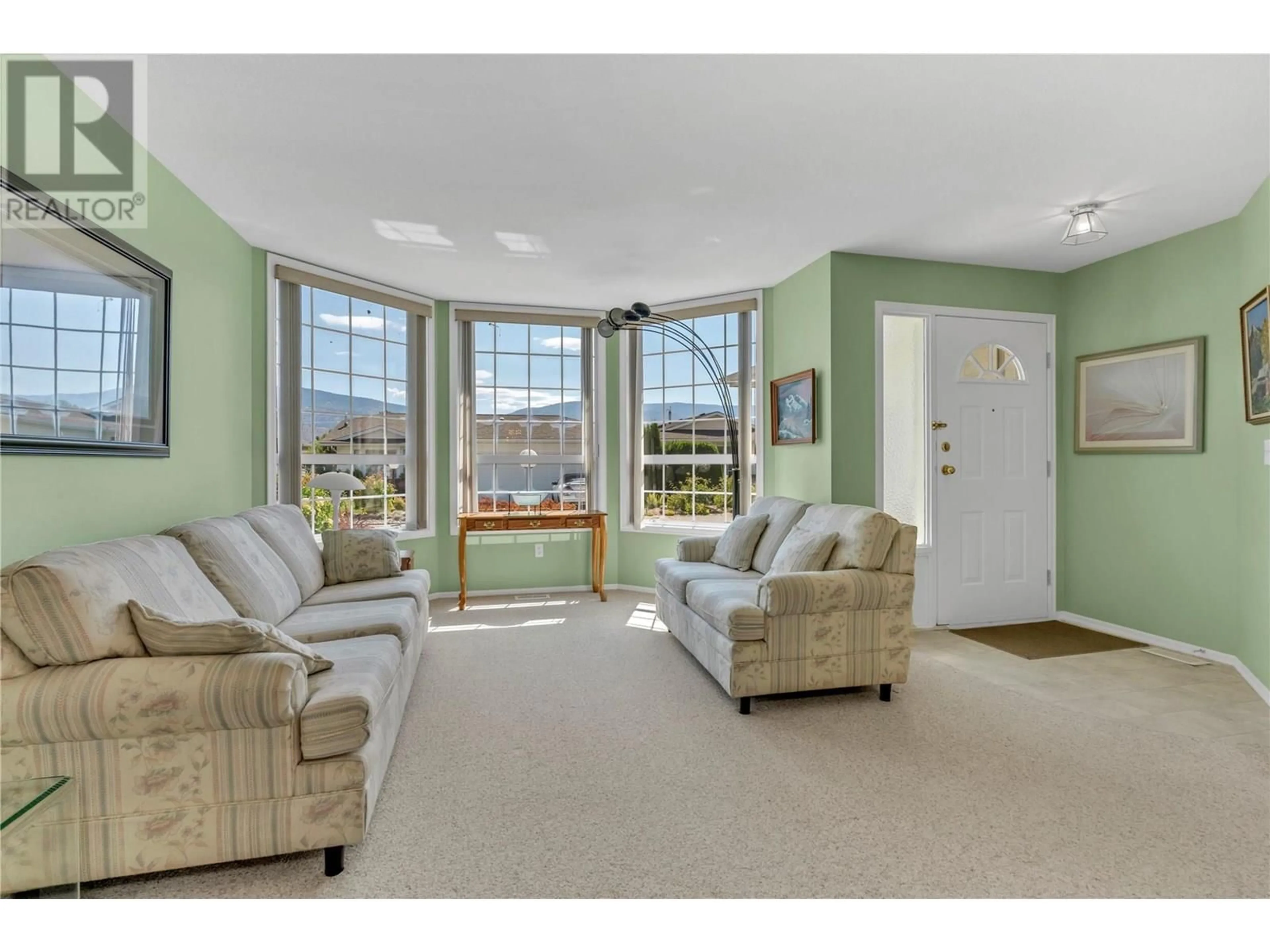 Living room with furniture, unknown for 210 SANDPIPER CRESCENT, Penticton British Columbia V2A8K6
