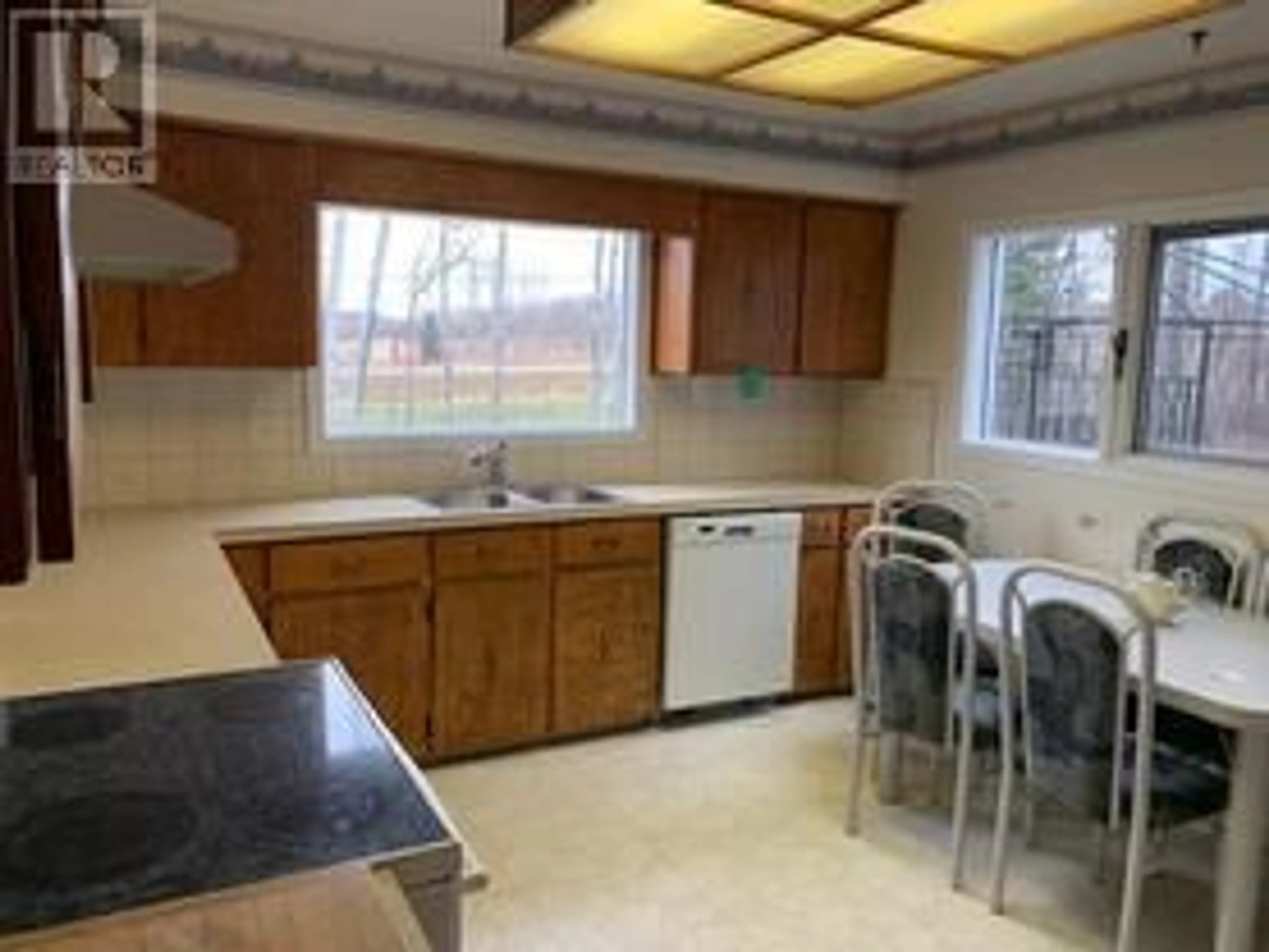 Standard kitchen, ceramic/tile floor for 13477 2 HIGHWAY, Dawson Creek British Columbia V0C2C0
