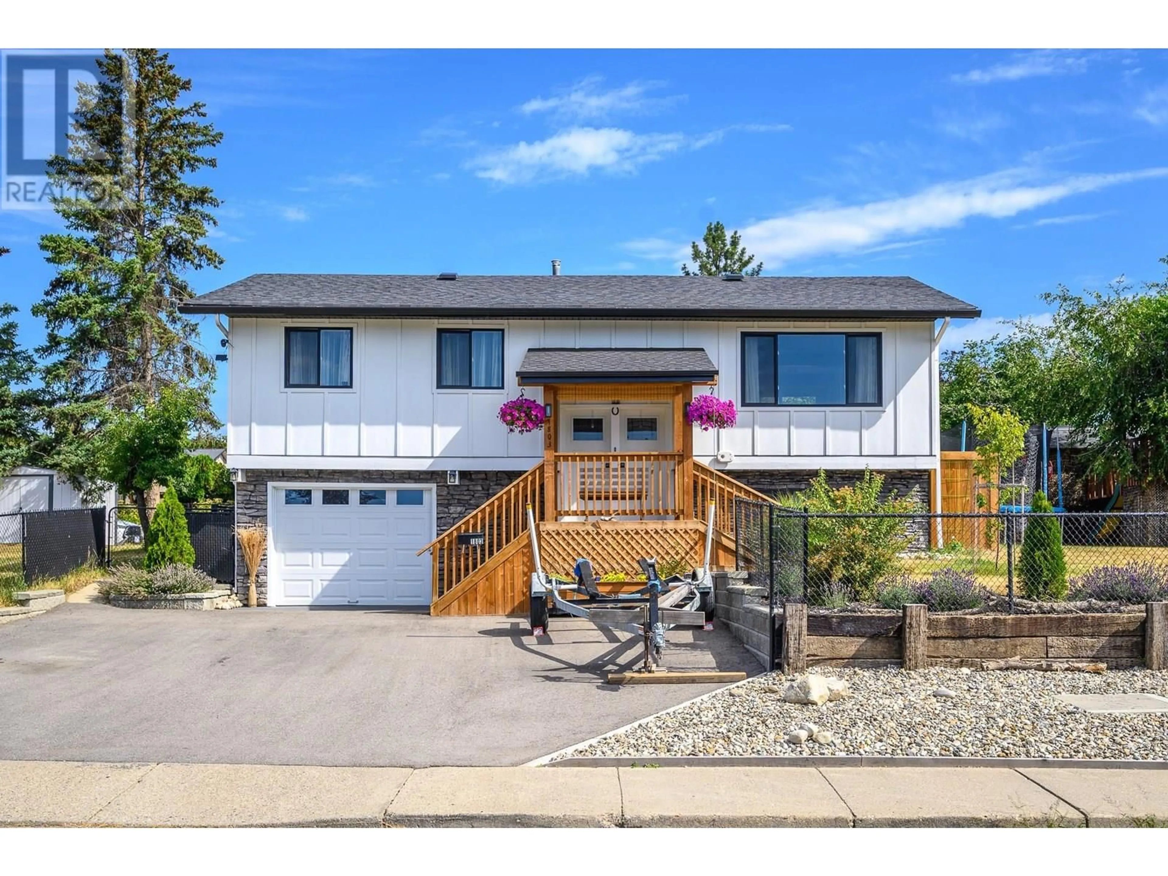Home with vinyl exterior material, street for 1803 20 AVENUE, Vernon British Columbia V1T7B8