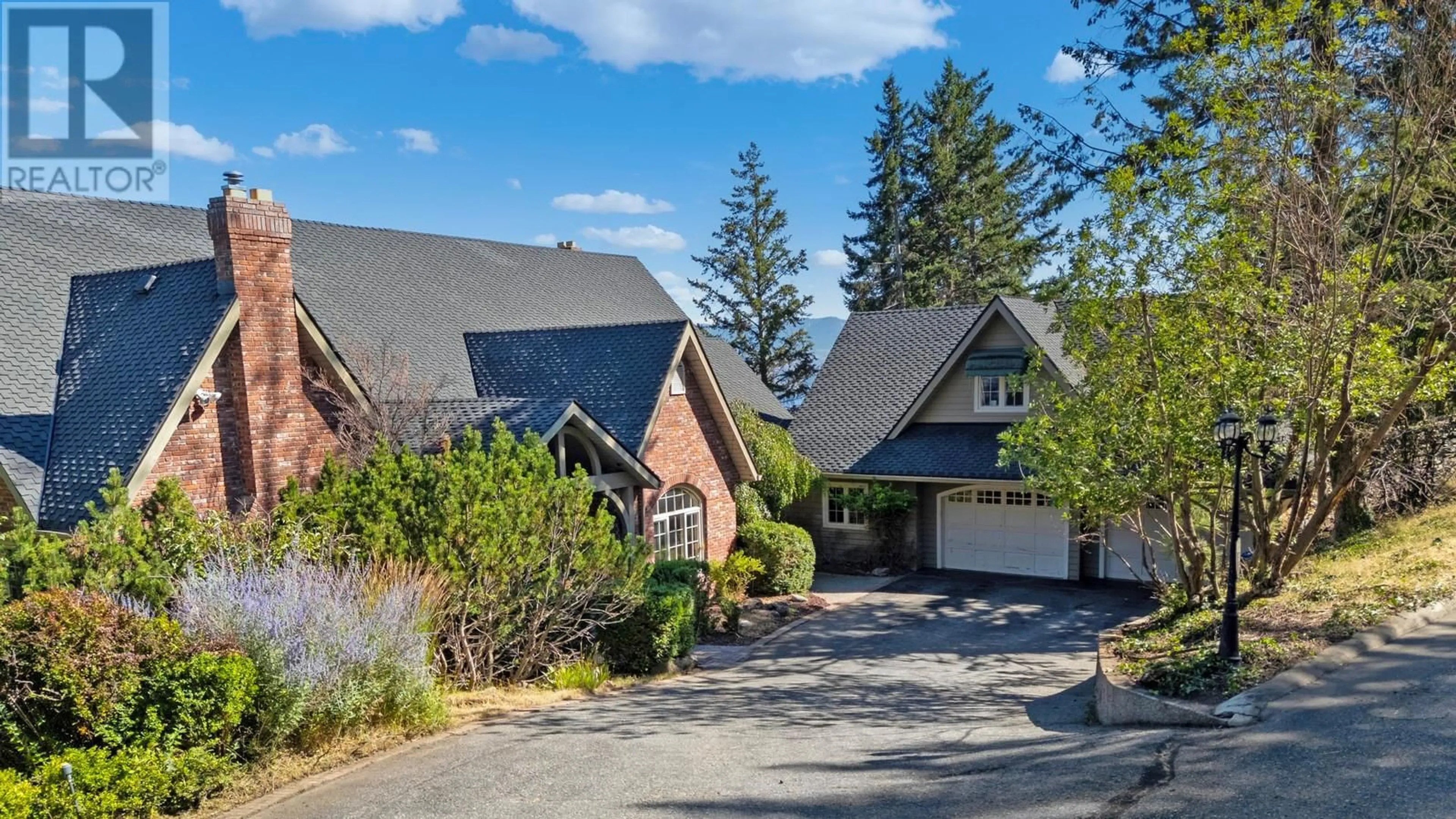 A pic from outside/outdoor area/front of a property/back of a property/a pic from drone, unknown for 1419 WEST KELOWNA ROAD, West Kelowna British Columbia V1Z3M7