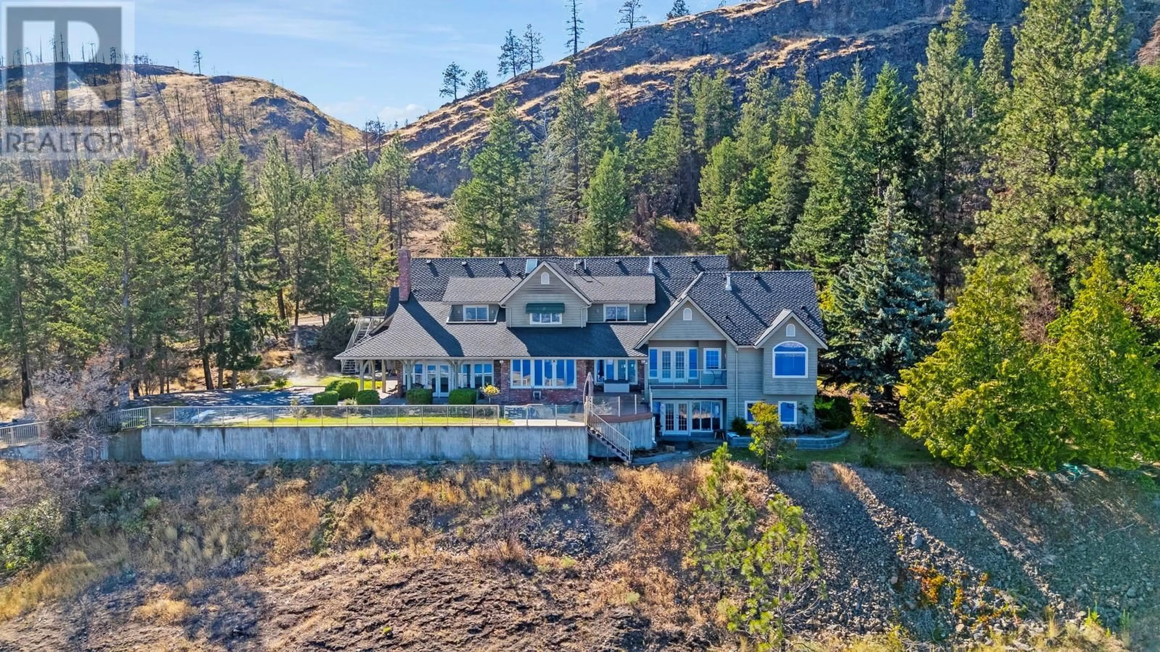 A pic from outside/outdoor area/front of a property/back of a property/a pic from drone, water/lake/river/ocean view for 1419 WEST KELOWNA ROAD, West Kelowna British Columbia V1Z3M7