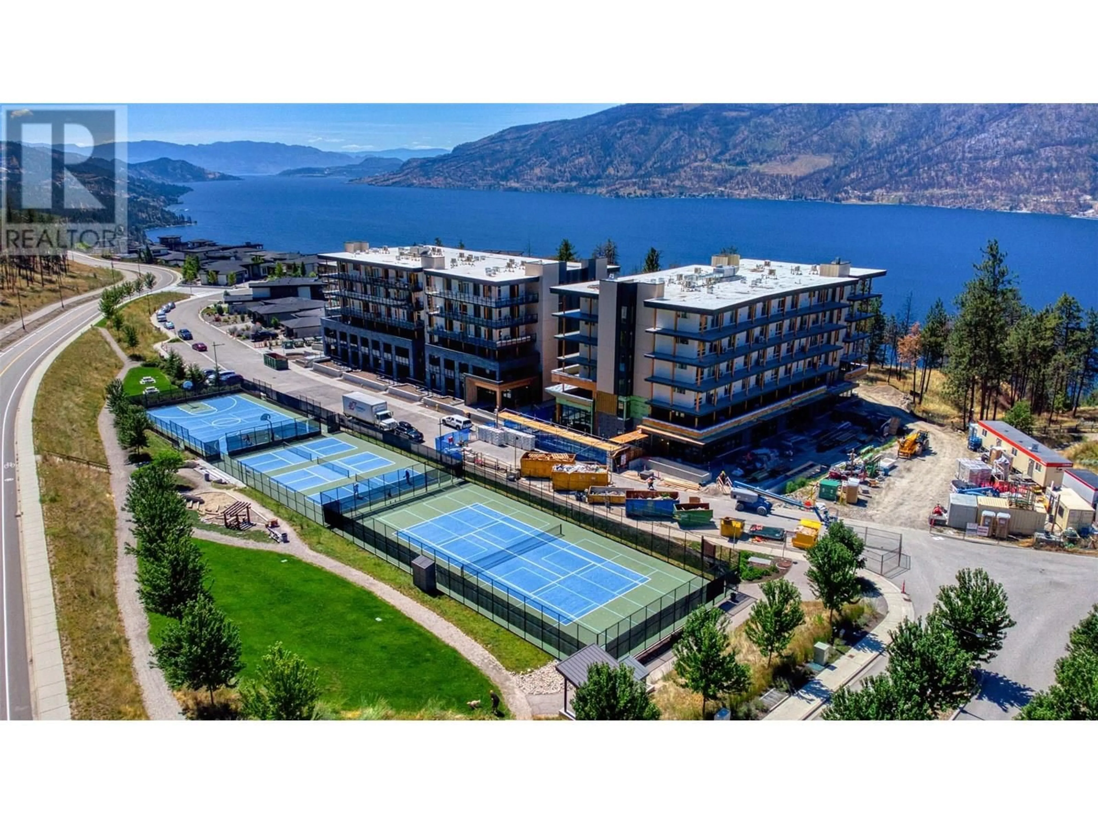 A pic from outside/outdoor area/front of a property/back of a property/a pic from drone, water/lake/river/ocean view for 306 - 9652 BENCHLAND DRIVE, Lake Country British Columbia V4V0C4