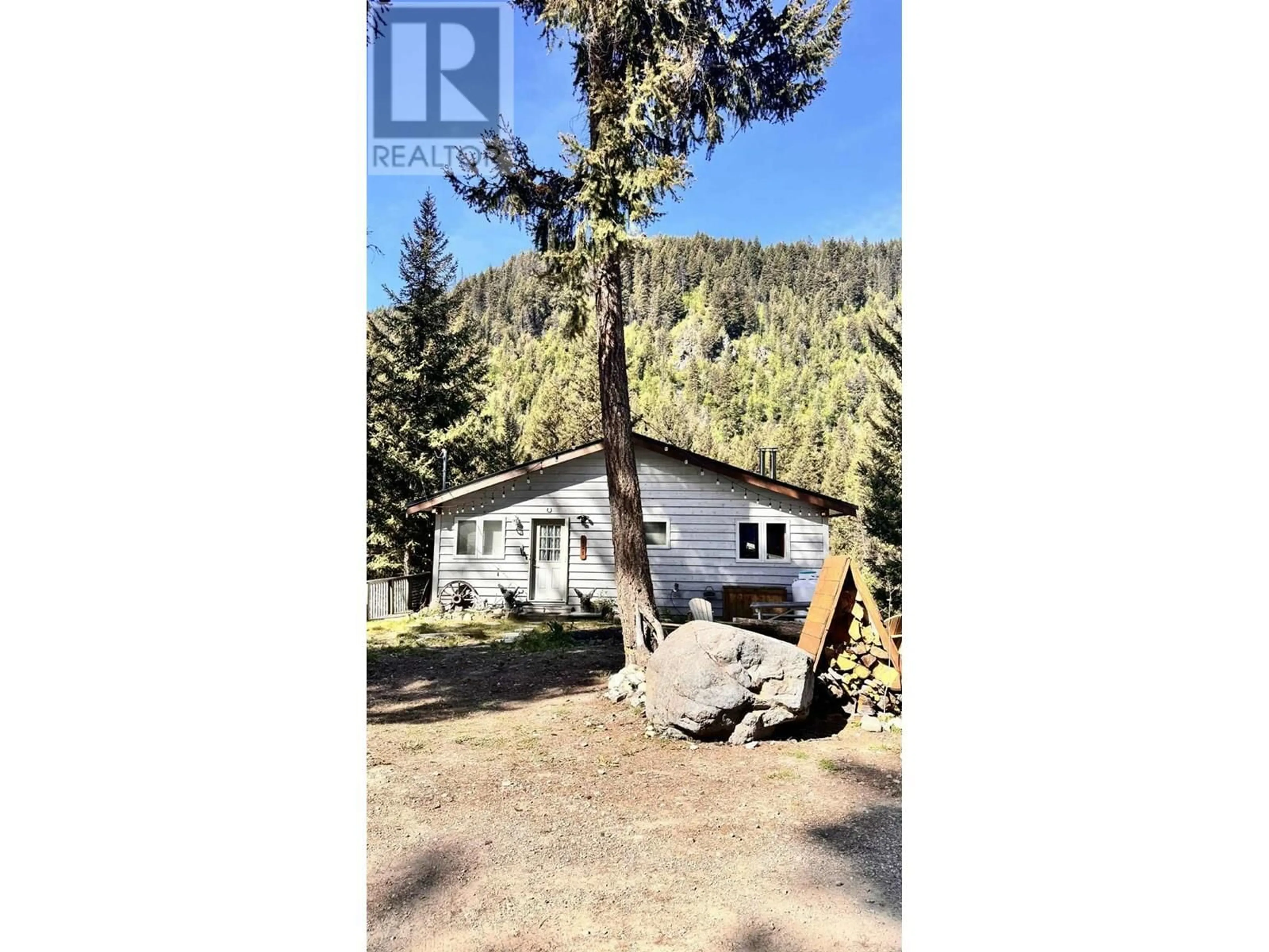 A pic from outside/outdoor area/front of a property/back of a property/a pic from drone, unknown for 221 PROSPECT DRIVE, Princeton British Columbia V0X1W0