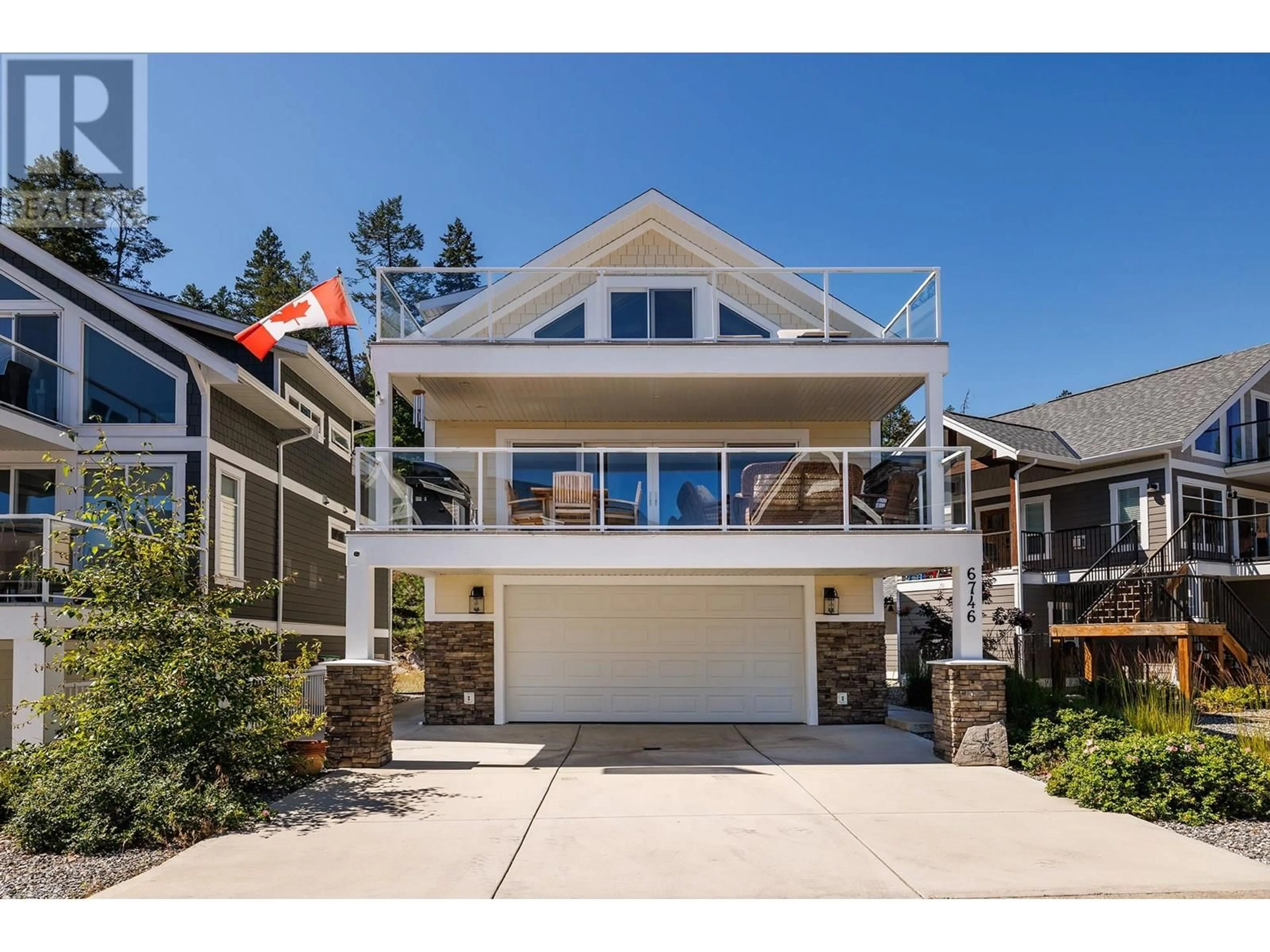 Home with vinyl exterior material, unknown for 6746 MARBELLA LOOP, Kelowna British Columbia V1Z3R8
