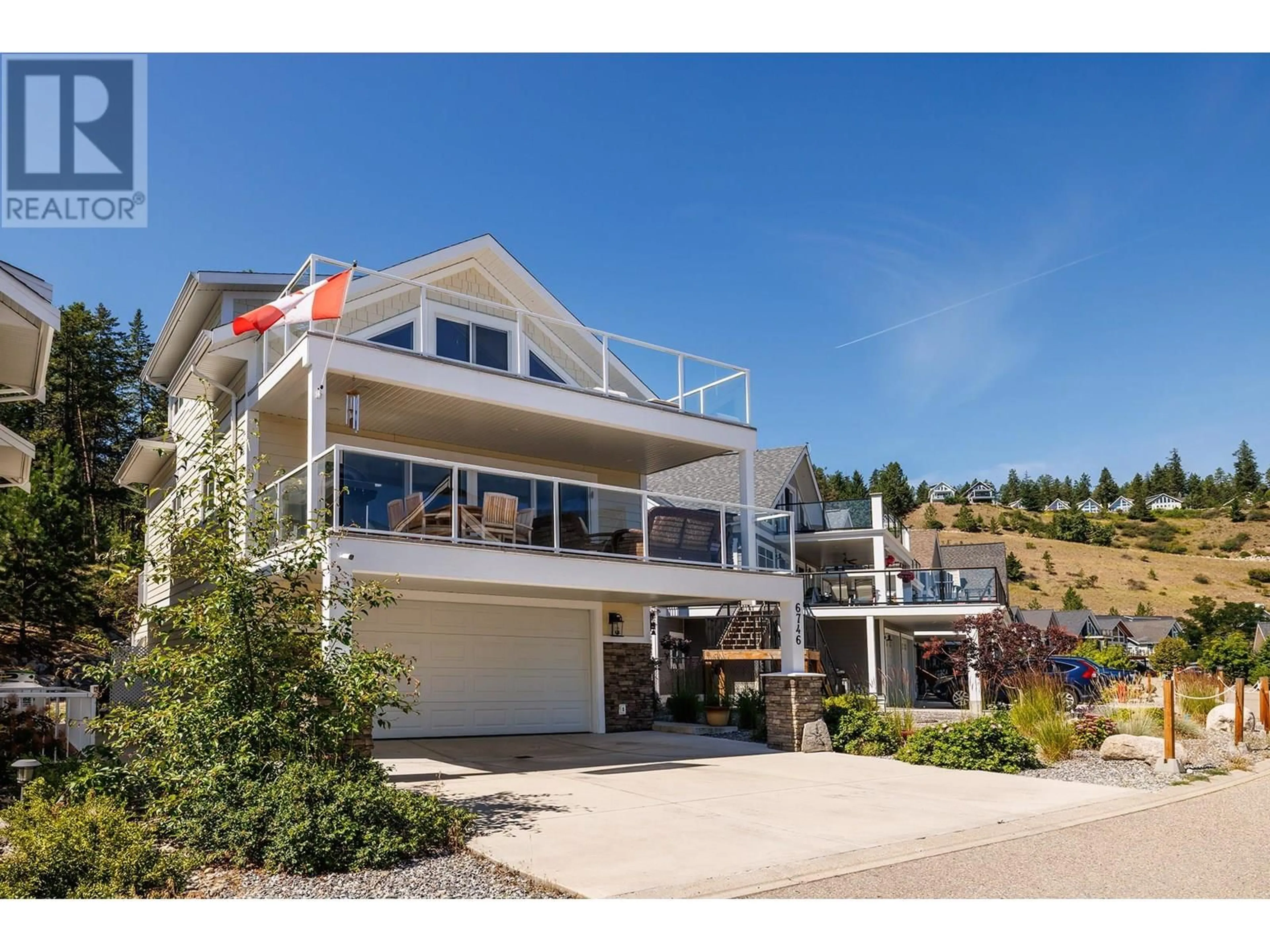 A pic from outside/outdoor area/front of a property/back of a property/a pic from drone, unknown for 6746 MARBELLA LOOP, Kelowna British Columbia V1Z3R8