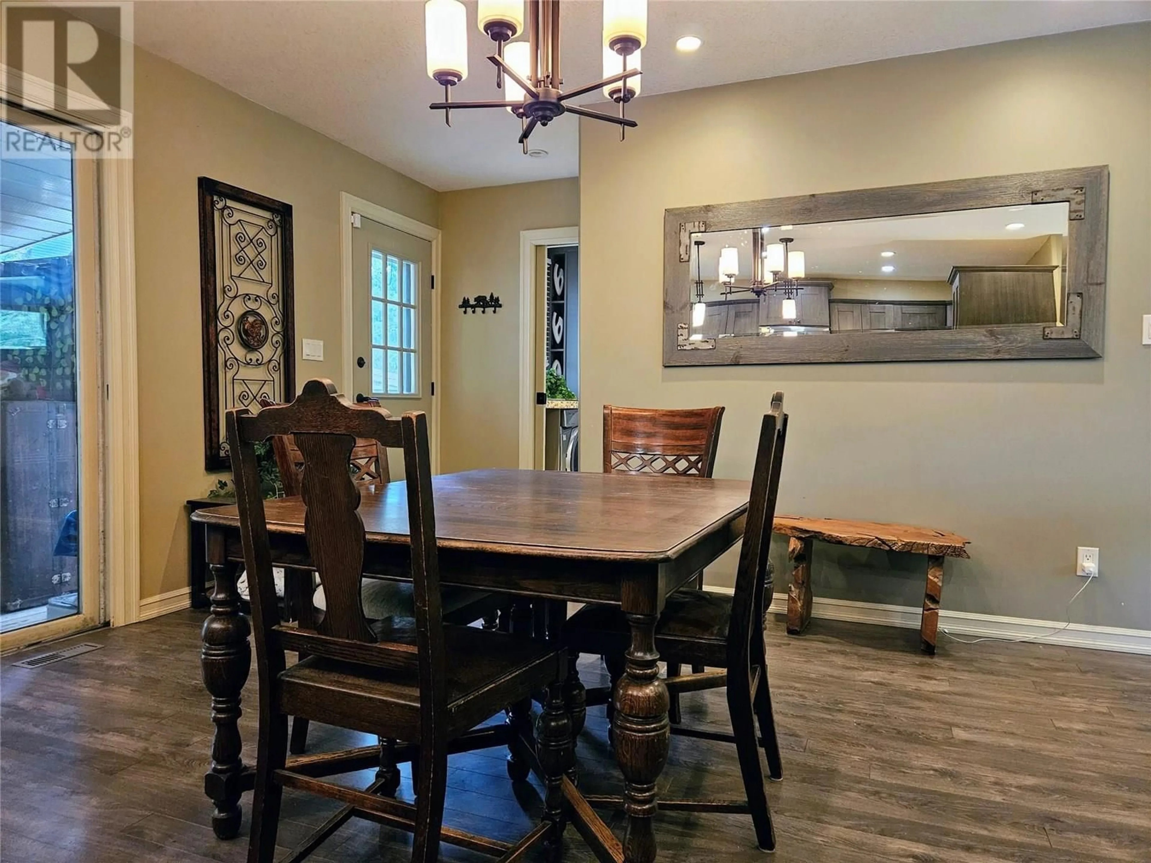 Dining room, wood/laminate floor for 1718 9TH AVENUE, Invermere British Columbia V0A1K0