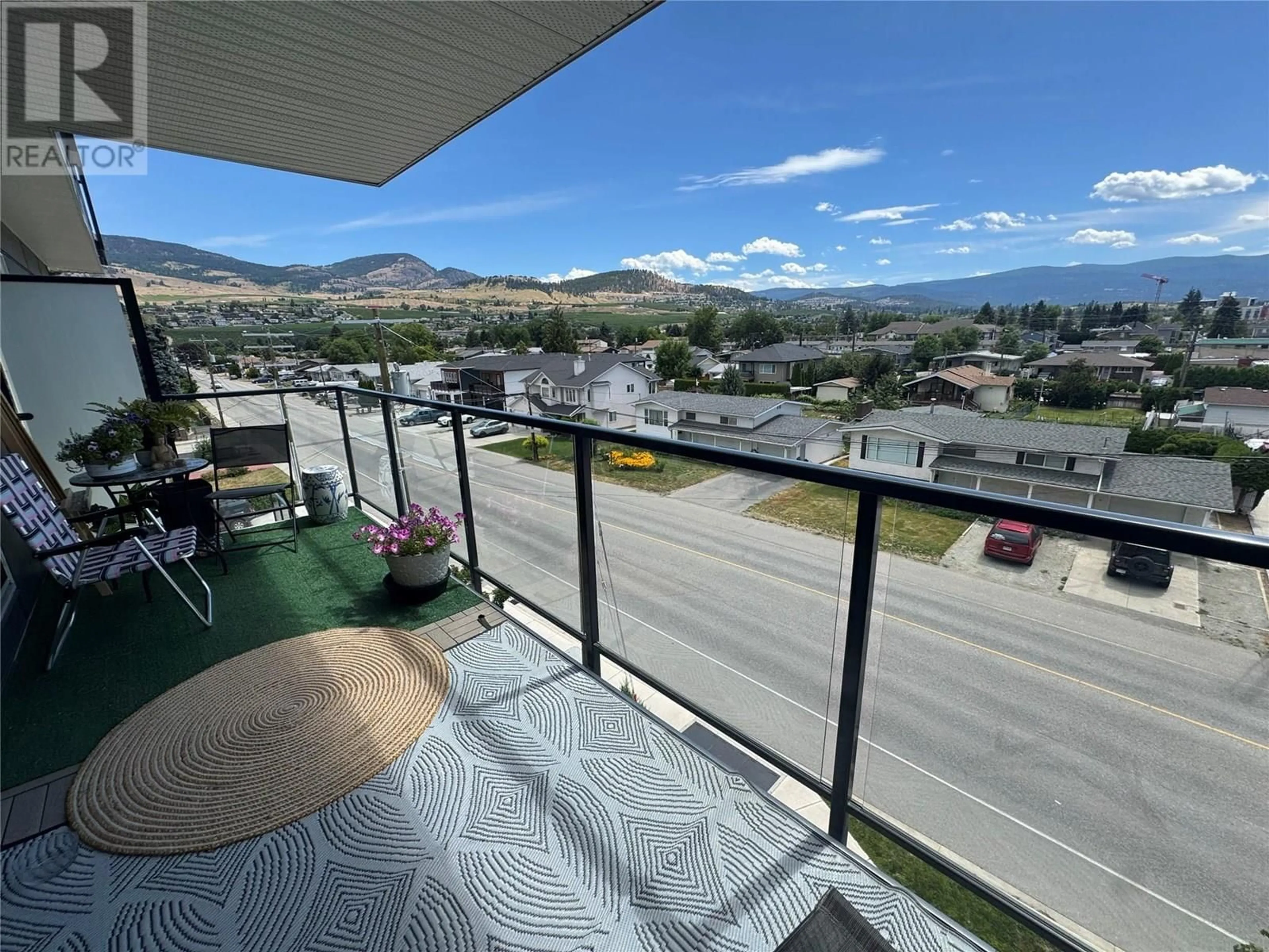 Balcony in the apartment, mountain view for 411 - 615 RUTLAND ROAD, Kelowna British Columbia V1X3V6