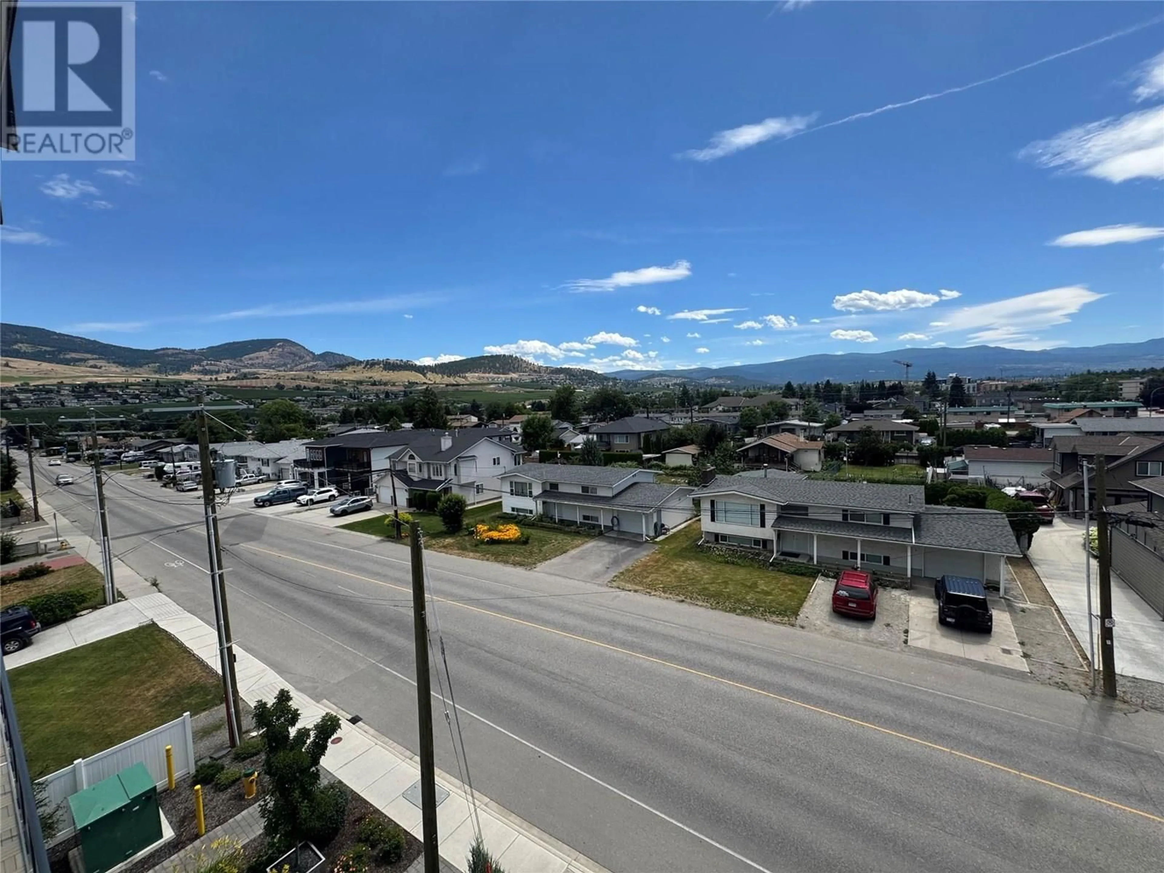 A pic from outside/outdoor area/front of a property/back of a property/a pic from drone, mountain view for 411 - 615 RUTLAND ROAD, Kelowna British Columbia V1X3V6
