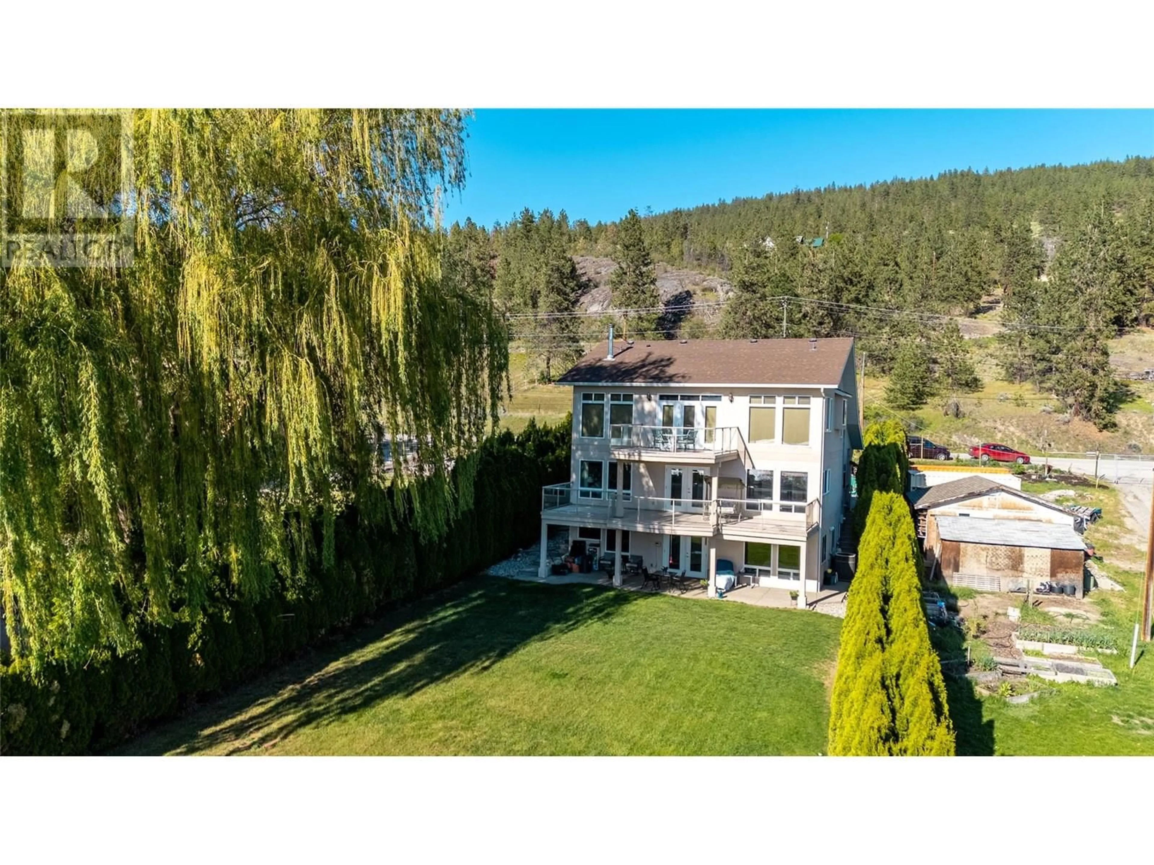 A pic from outside/outdoor area/front of a property/back of a property/a pic from drone, mountain view for 4343 NARAMATA ROAD NORTH, Naramata British Columbia V0H1N1
