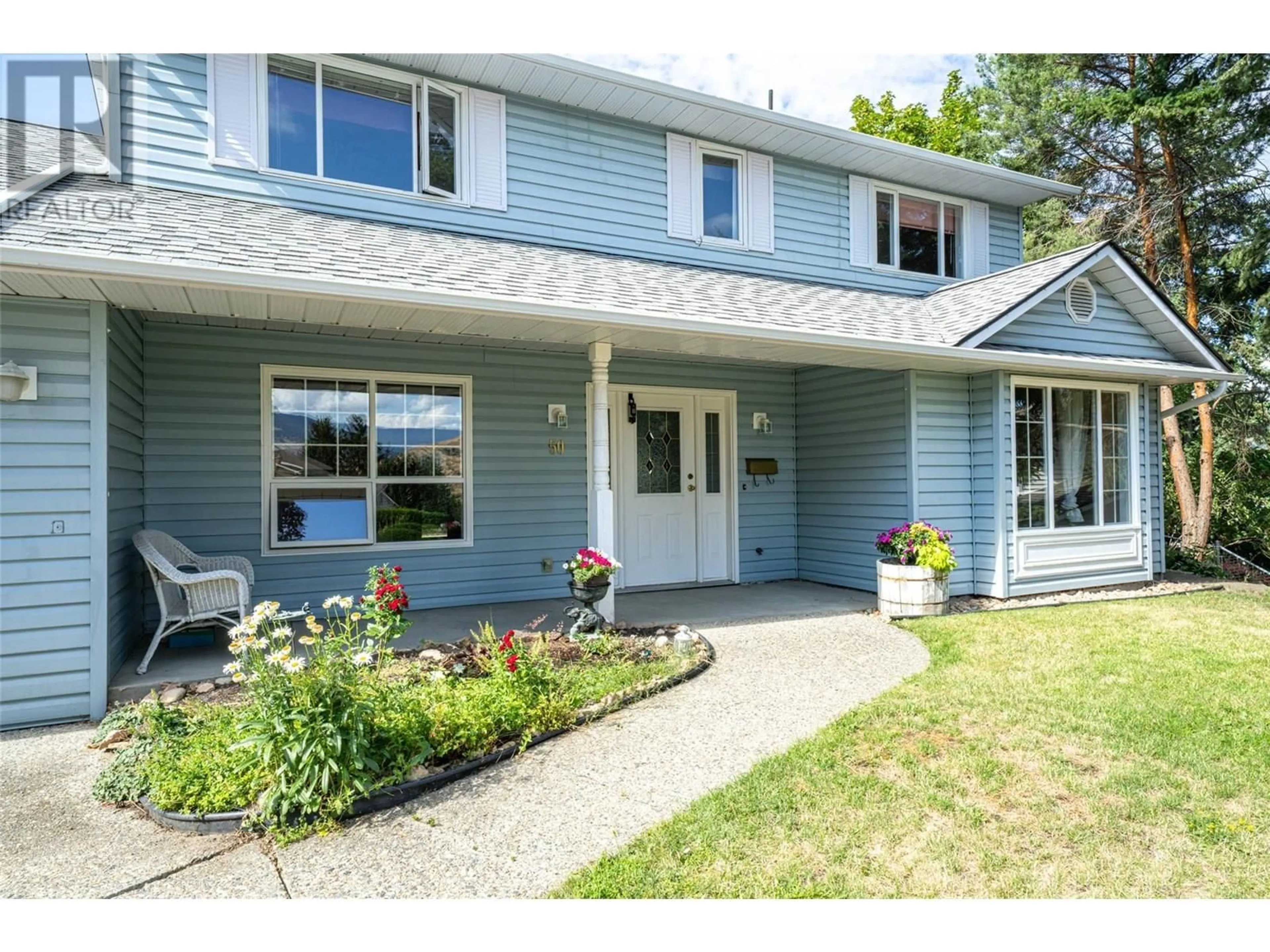 Home with vinyl exterior material, street for 50 LOCHHAVEN COURT, Coldstream British Columbia V1G2G9