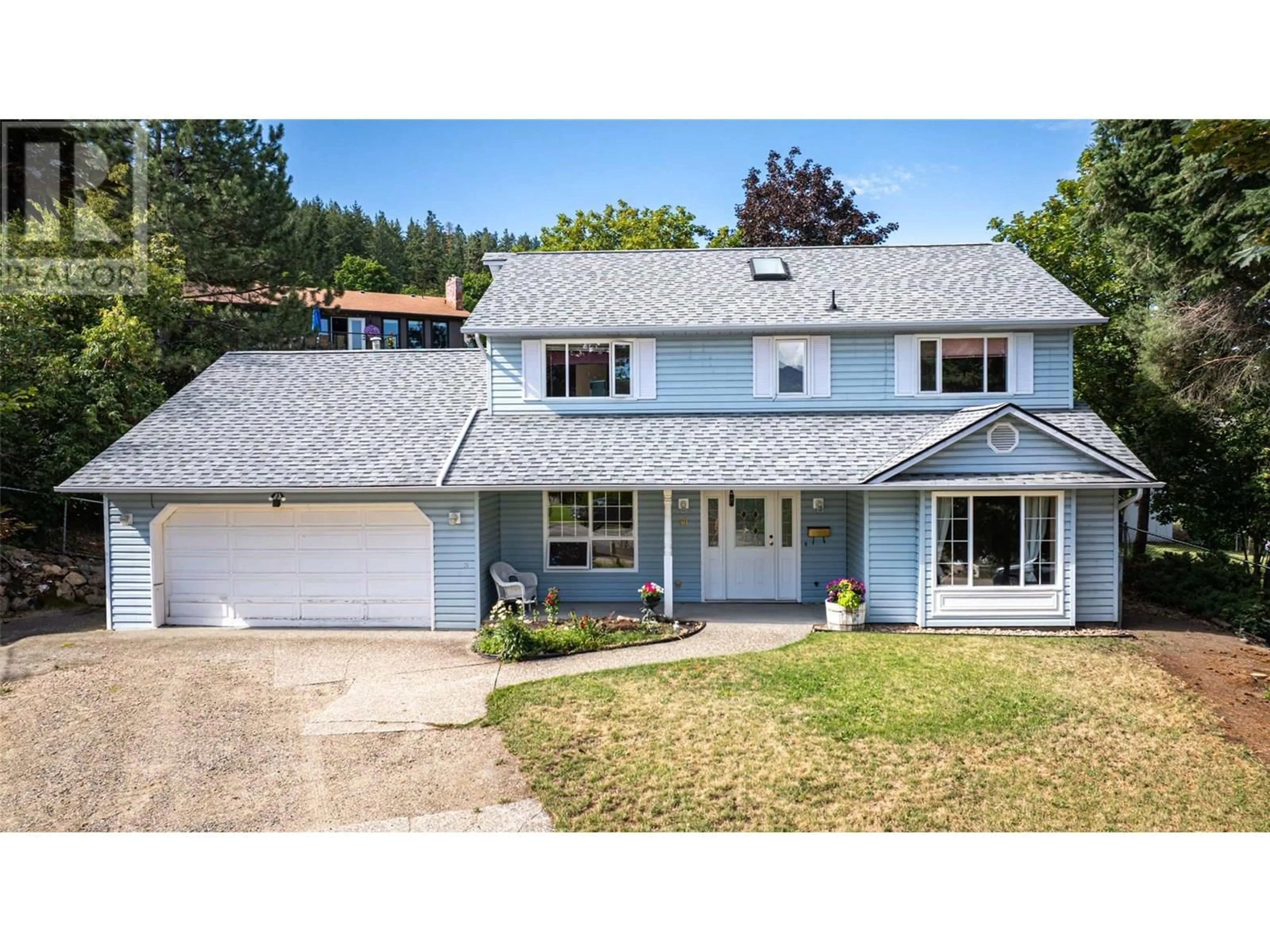 Home with vinyl exterior material, street for 50 LOCHHAVEN COURT, Coldstream British Columbia V1G2G9