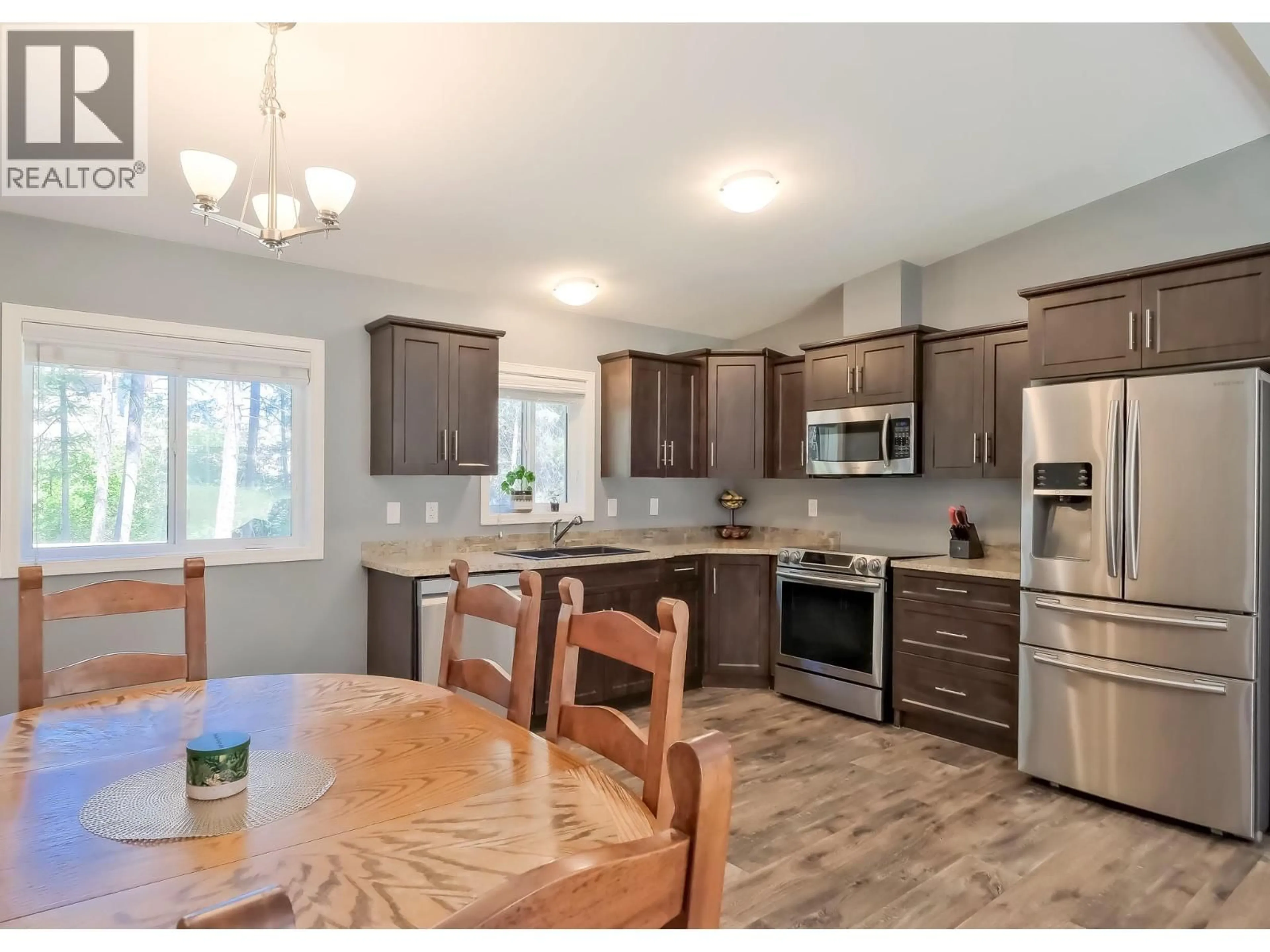 Open concept kitchen, unknown for 7867 ALPINE ROAD, Kelowna British Columbia V1Z3V4
