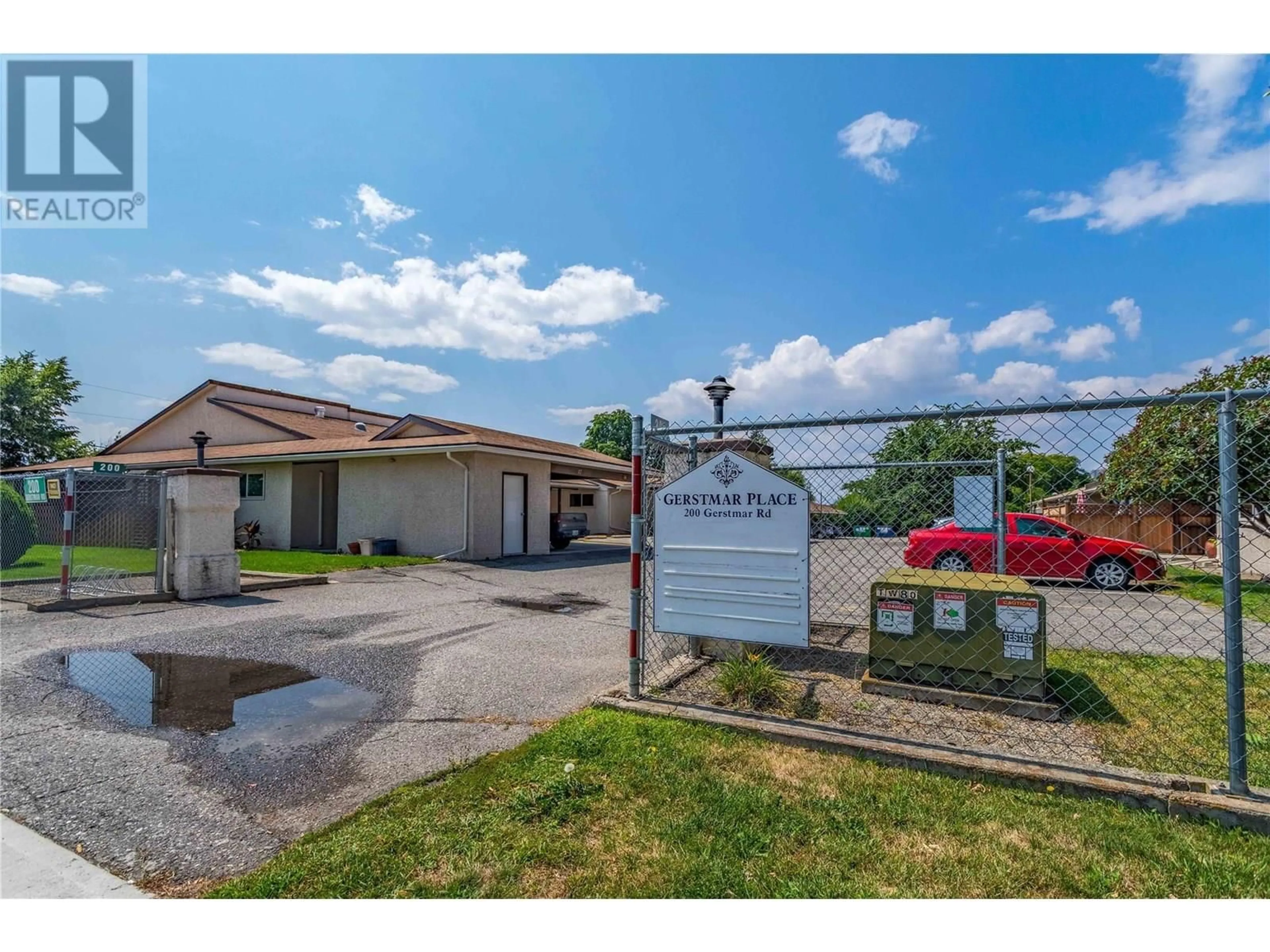 A pic from outside/outdoor area/front of a property/back of a property/a pic from drone, unknown for 10 - 200 GERSTMAR ROAD, Kelowna British Columbia V1X4A7