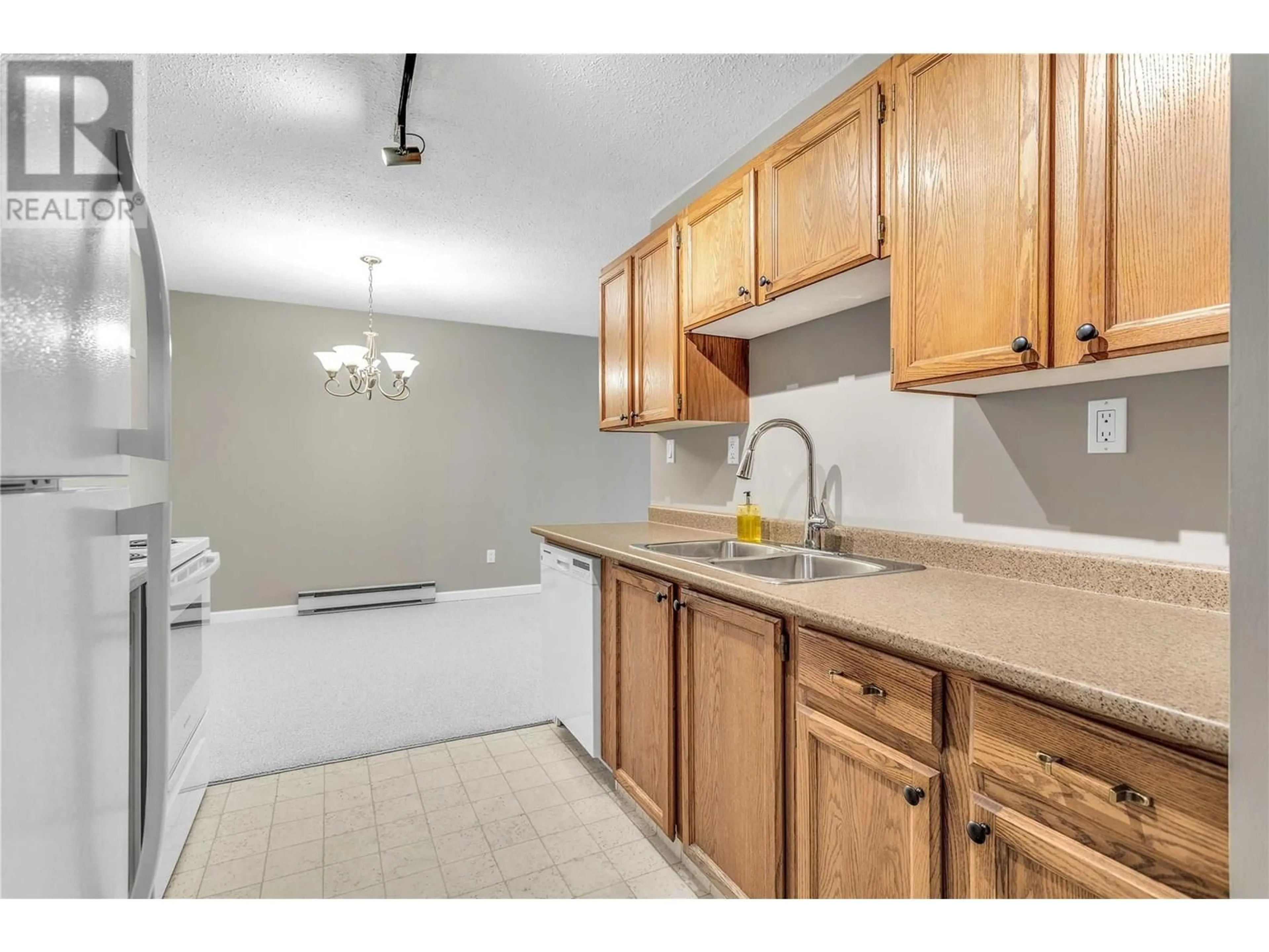 Standard kitchen, unknown for 10 - 200 GERSTMAR ROAD, Kelowna British Columbia V1X4A7