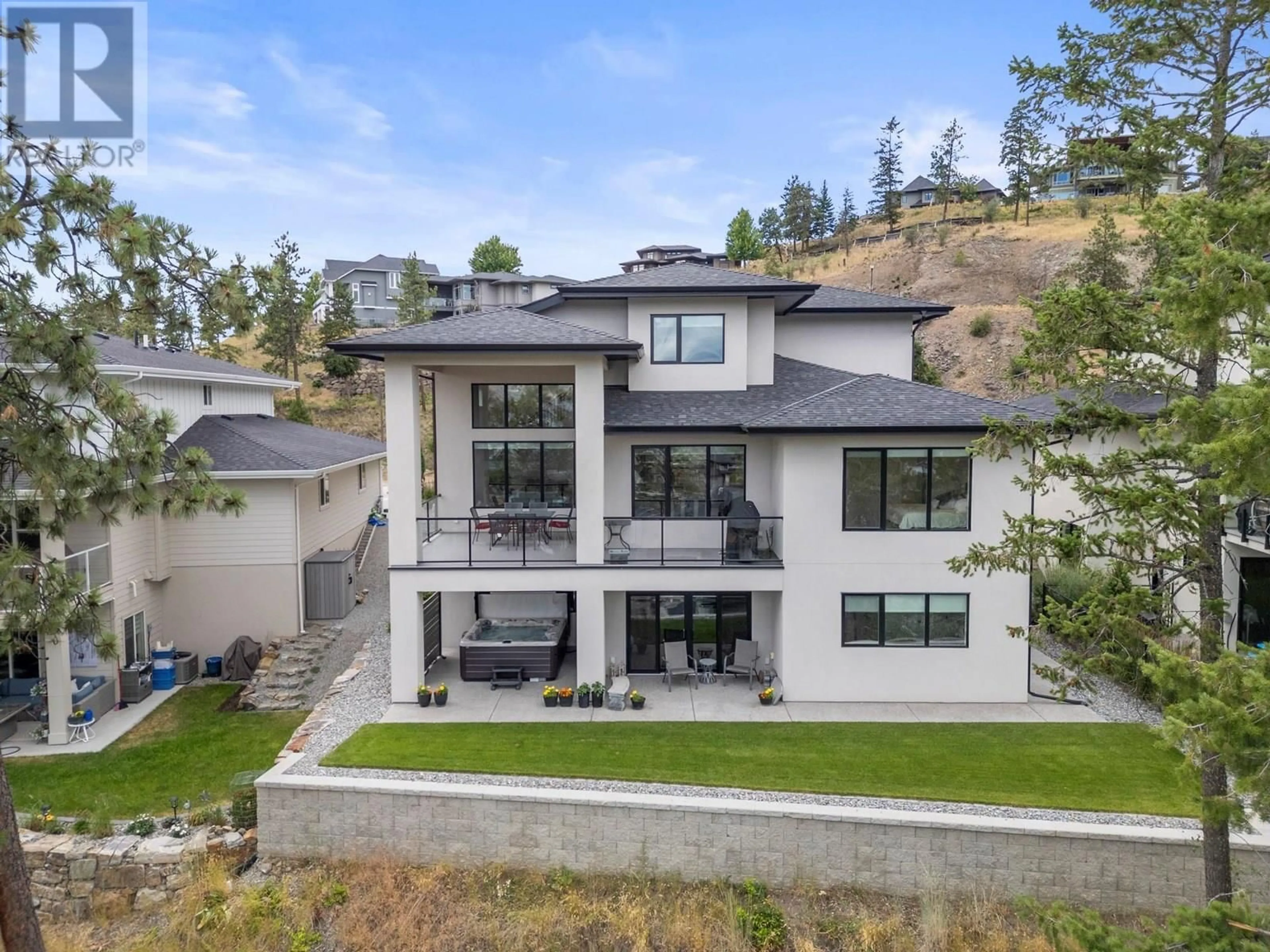 A pic from outside/outdoor area/front of a property/back of a property/a pic from drone, mountain view for 145 SUMMER WOOD DRIVE, Kelowna British Columbia V1V0C9