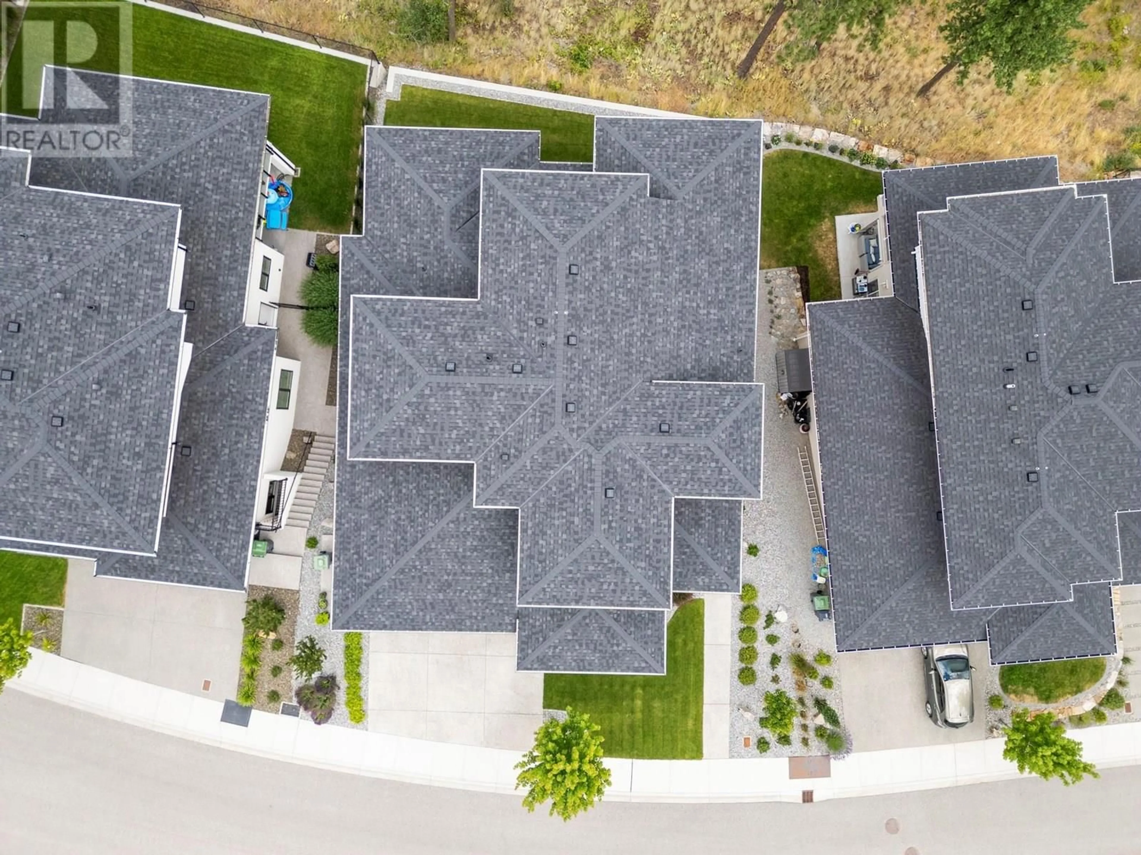 A pic from outside/outdoor area/front of a property/back of a property/a pic from drone, street for 145 SUMMER WOOD DRIVE, Kelowna British Columbia V1V0C9