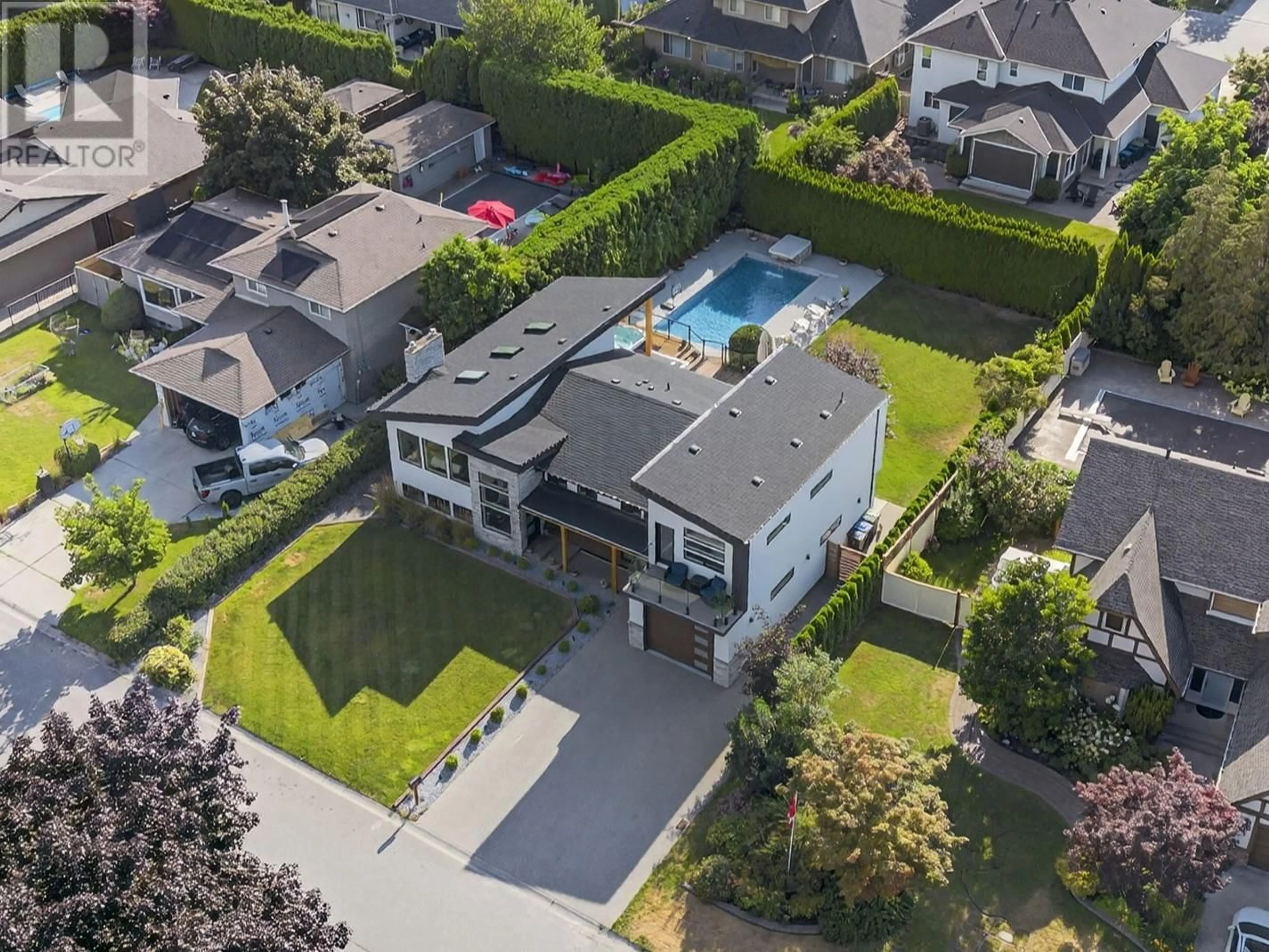 A pic from outside/outdoor area/front of a property/back of a property/a pic from drone, street for 4354 KENSINGTON DRIVE, Kelowna British Columbia V1W2L8