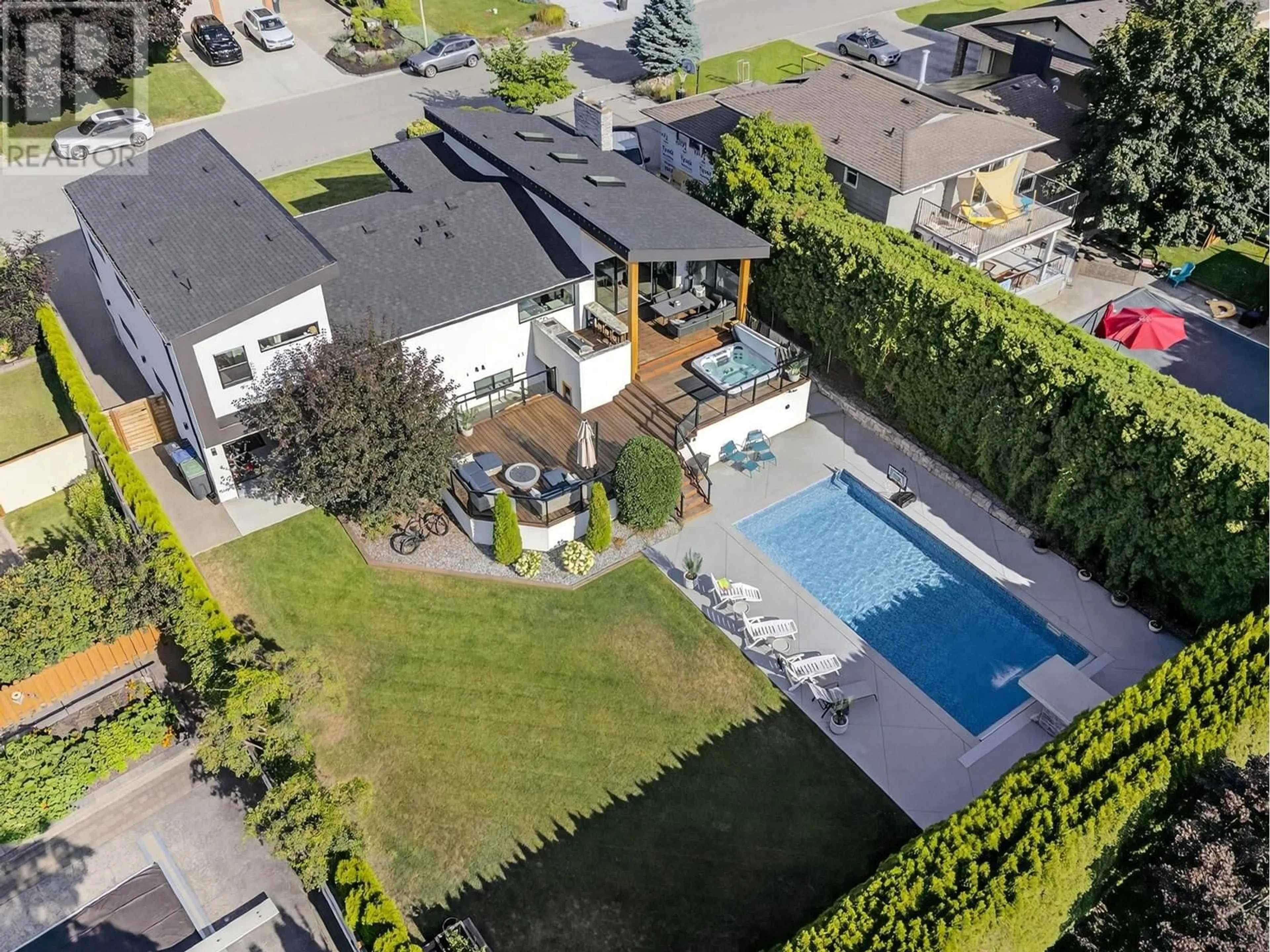 A pic from outside/outdoor area/front of a property/back of a property/a pic from drone, street for 4354 KENSINGTON DRIVE, Kelowna British Columbia V1W2L8