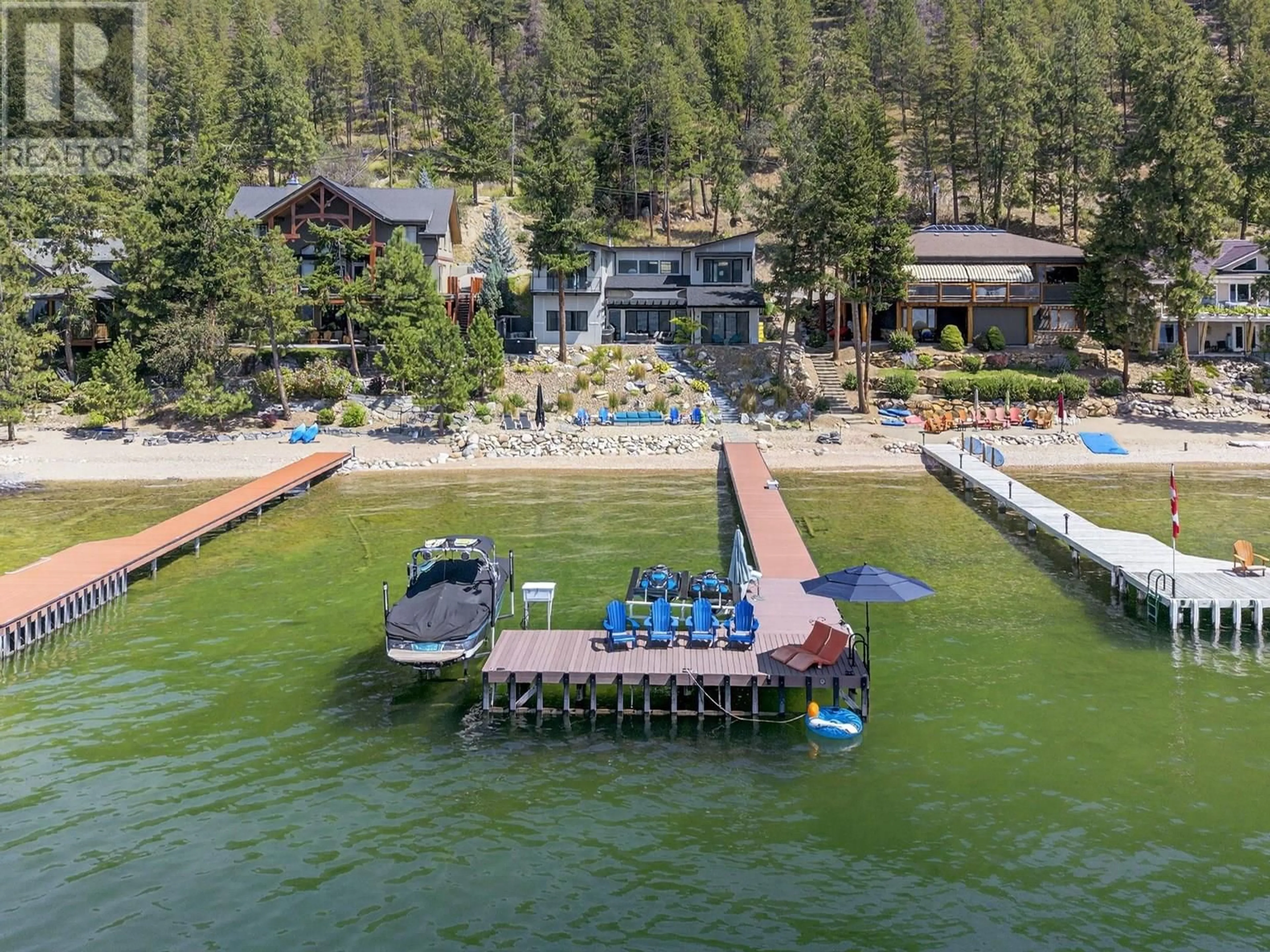A pic from outside/outdoor area/front of a property/back of a property/a pic from drone, water/lake/river/ocean view for 20 - 9900 EASTSIDE ROAD, Vernon British Columbia V1H1L6