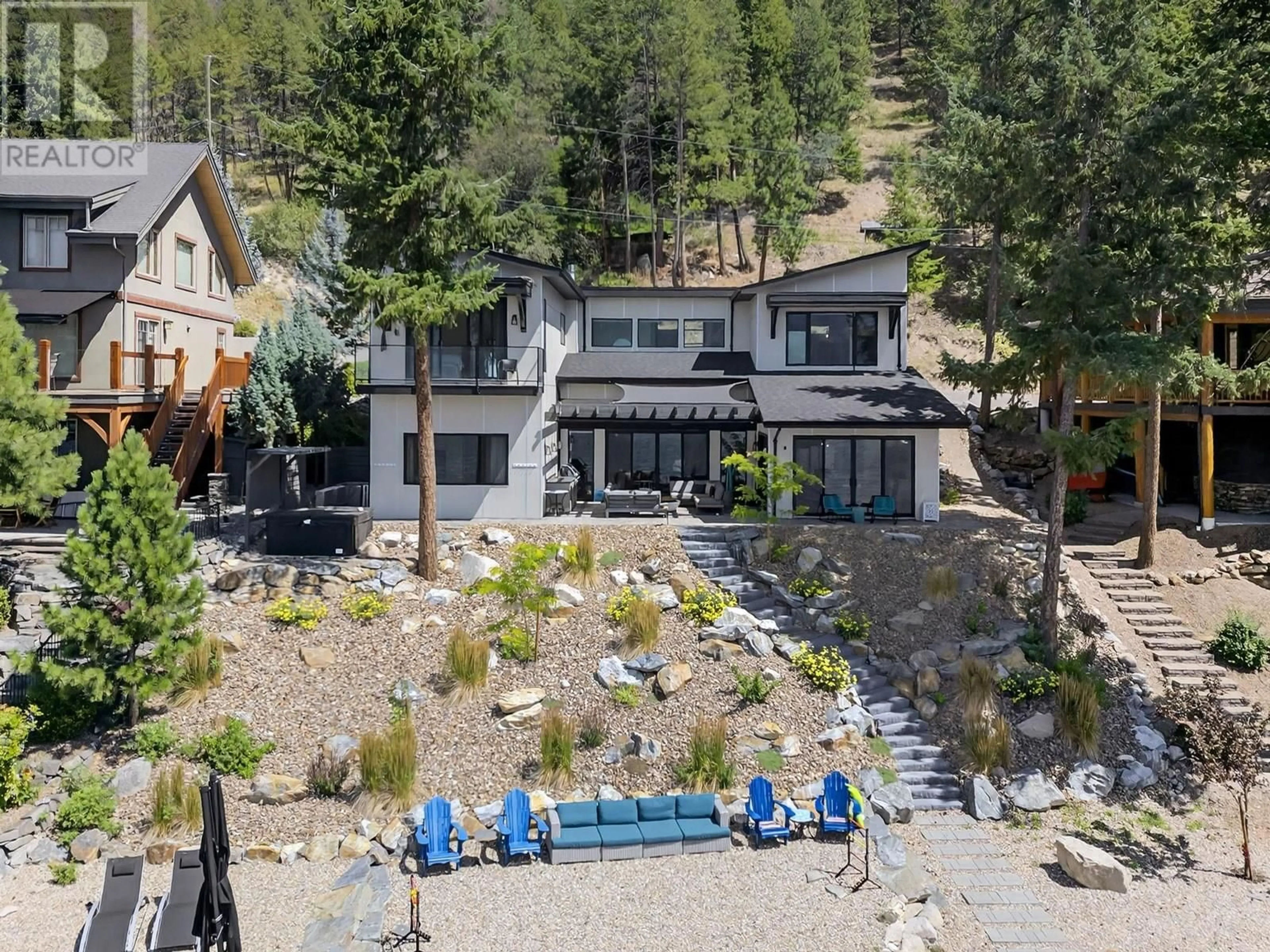 A pic from outside/outdoor area/front of a property/back of a property/a pic from drone, water/lake/river/ocean view for 20 - 9900 EASTSIDE ROAD, Vernon British Columbia V1H1L6