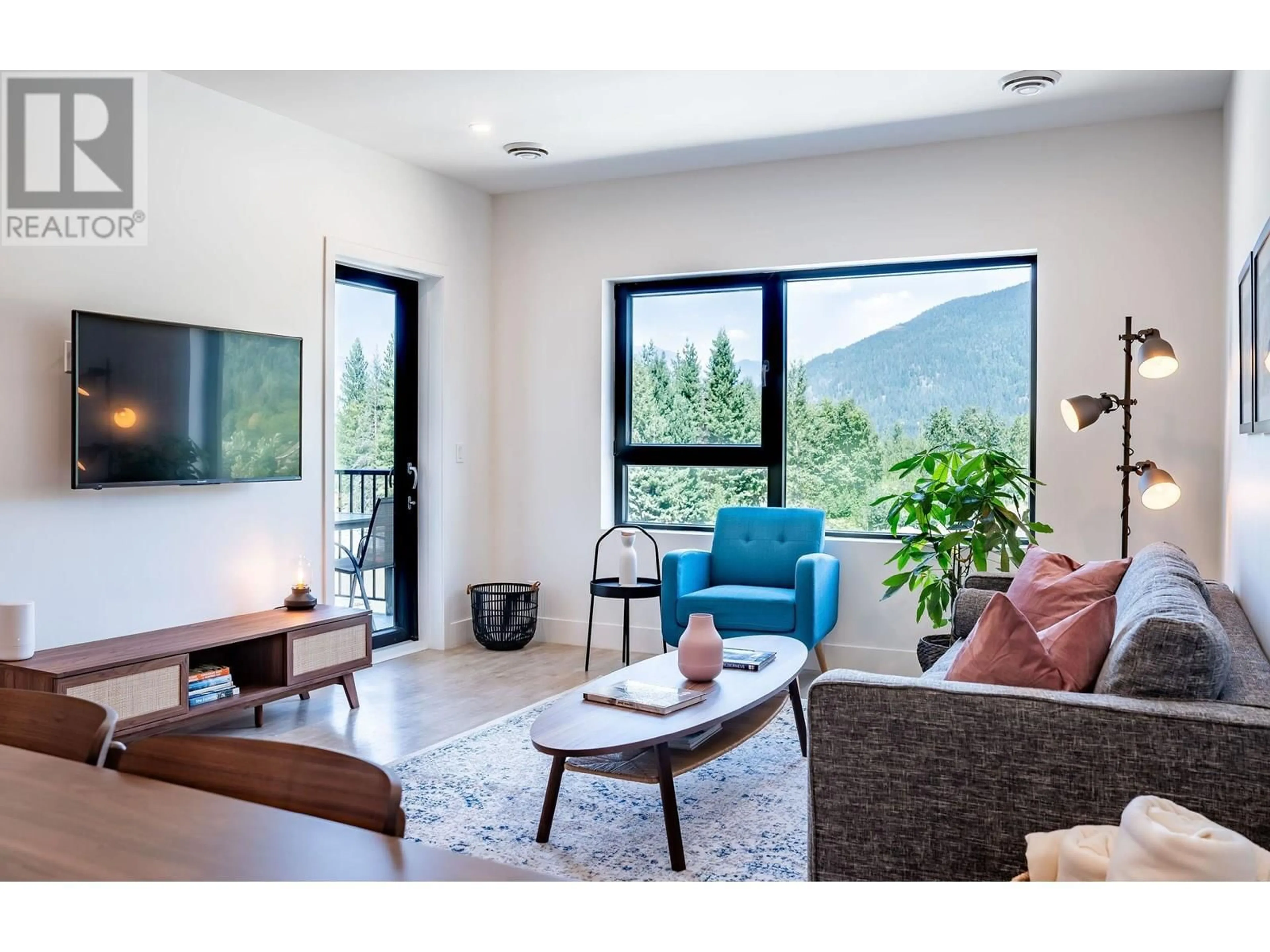 Living room with furniture, unknown for 2406 - 1701 COURSIER AVENUE, Revelstoke British Columbia V0E2S3