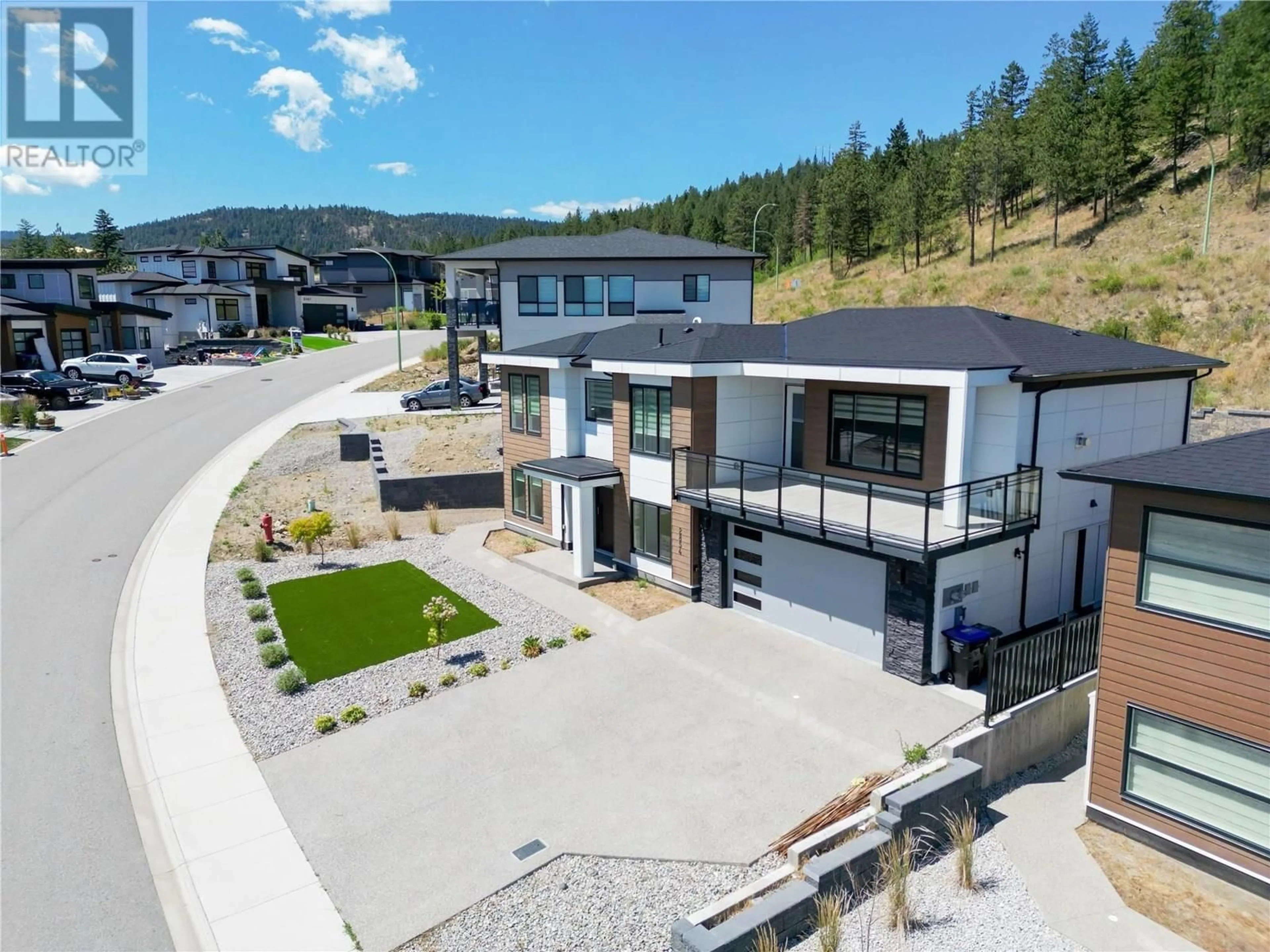A pic from outside/outdoor area/front of a property/back of a property/a pic from drone, mountain view for 2854 COPPER RIDGE DRIVE, West Kelowna British Columbia V4T2X6
