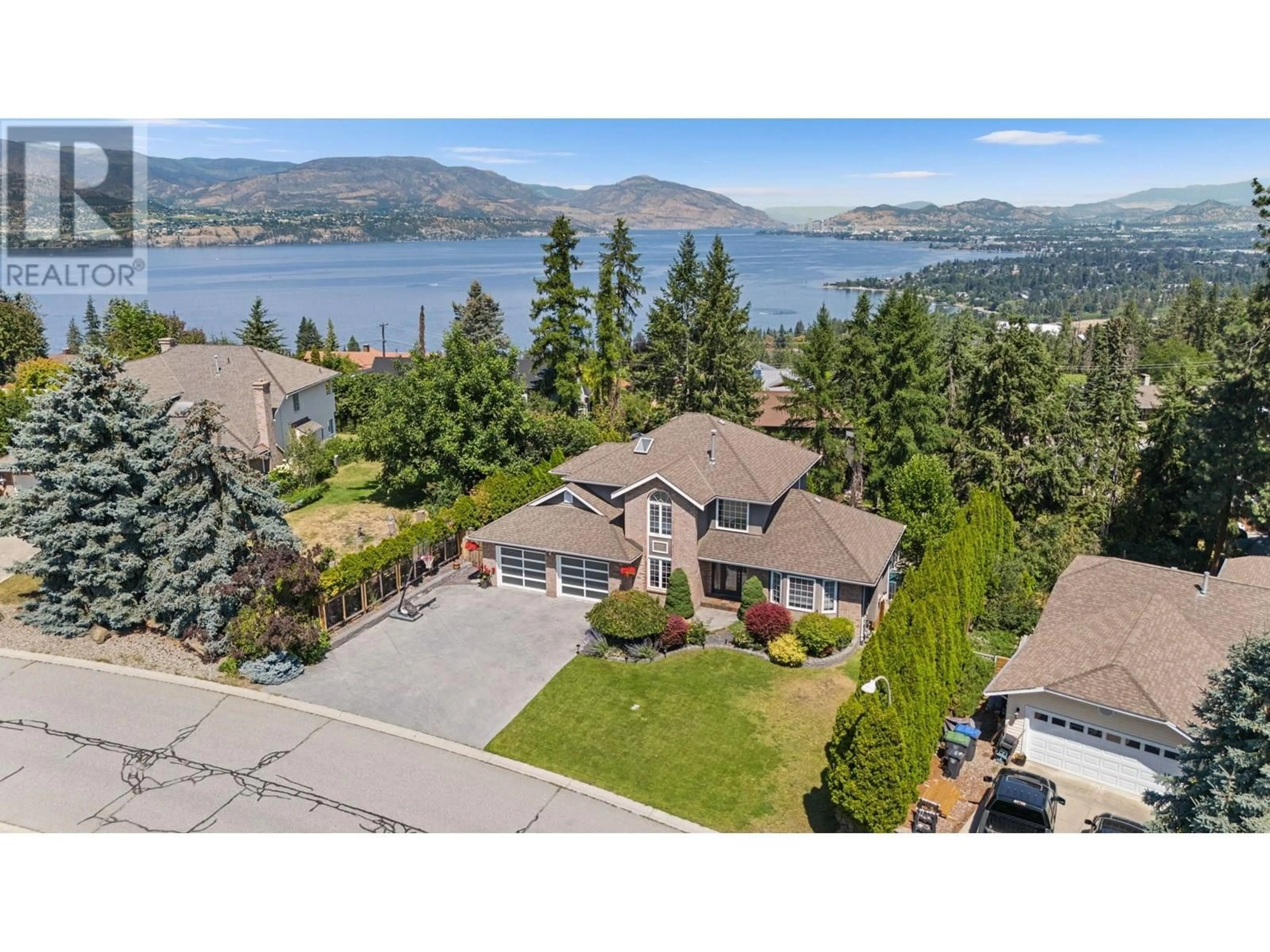 A pic from outside/outdoor area/front of a property/back of a property/a pic from drone, water/lake/river/ocean view for 409 CURLEW DRIVE, Kelowna British Columbia V1W4L3