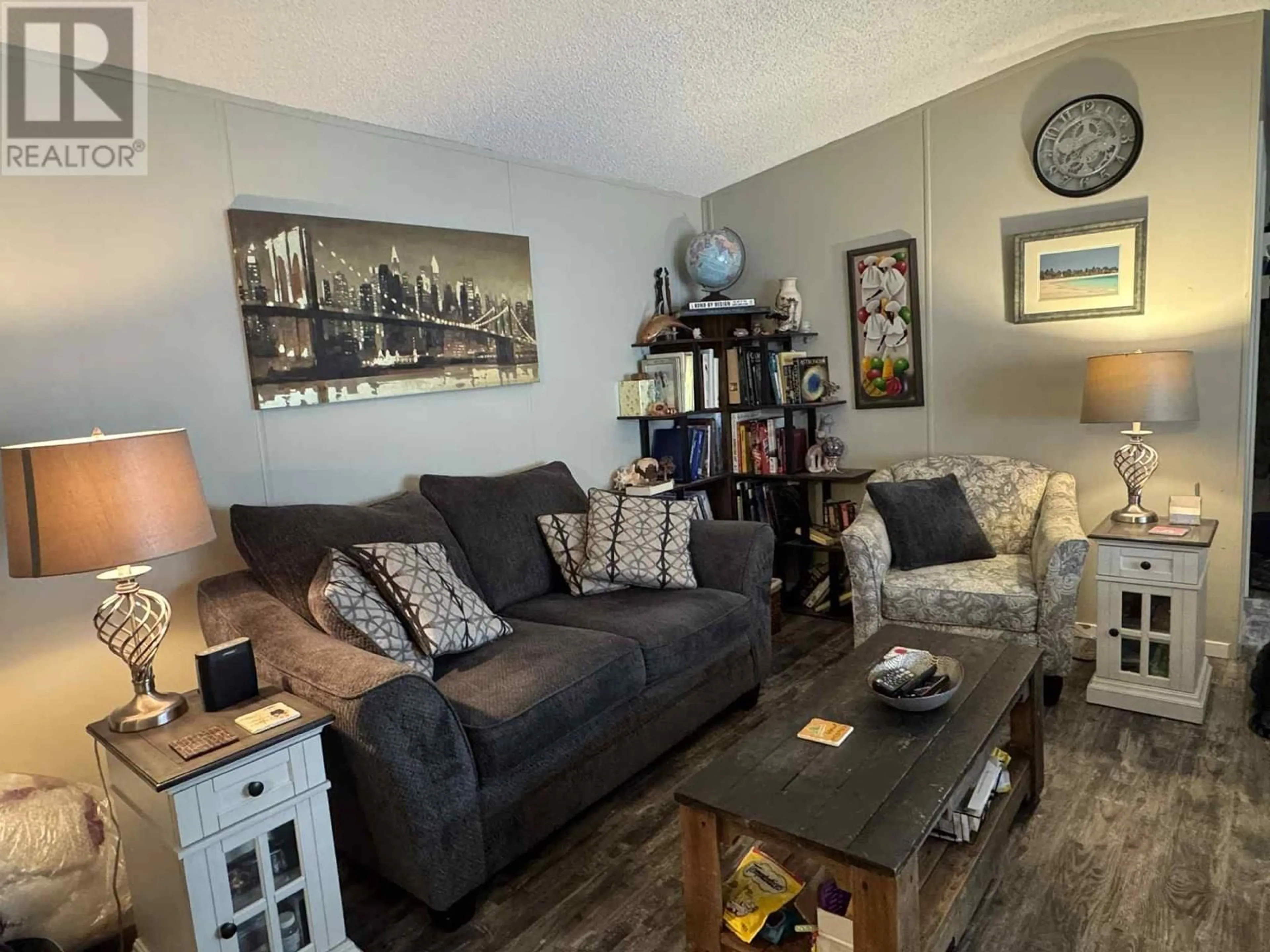 Living room with furniture, wood/laminate floor for 65 - 4965 PINE ACRES ROAD, Kamloops British Columbia V0E1M3