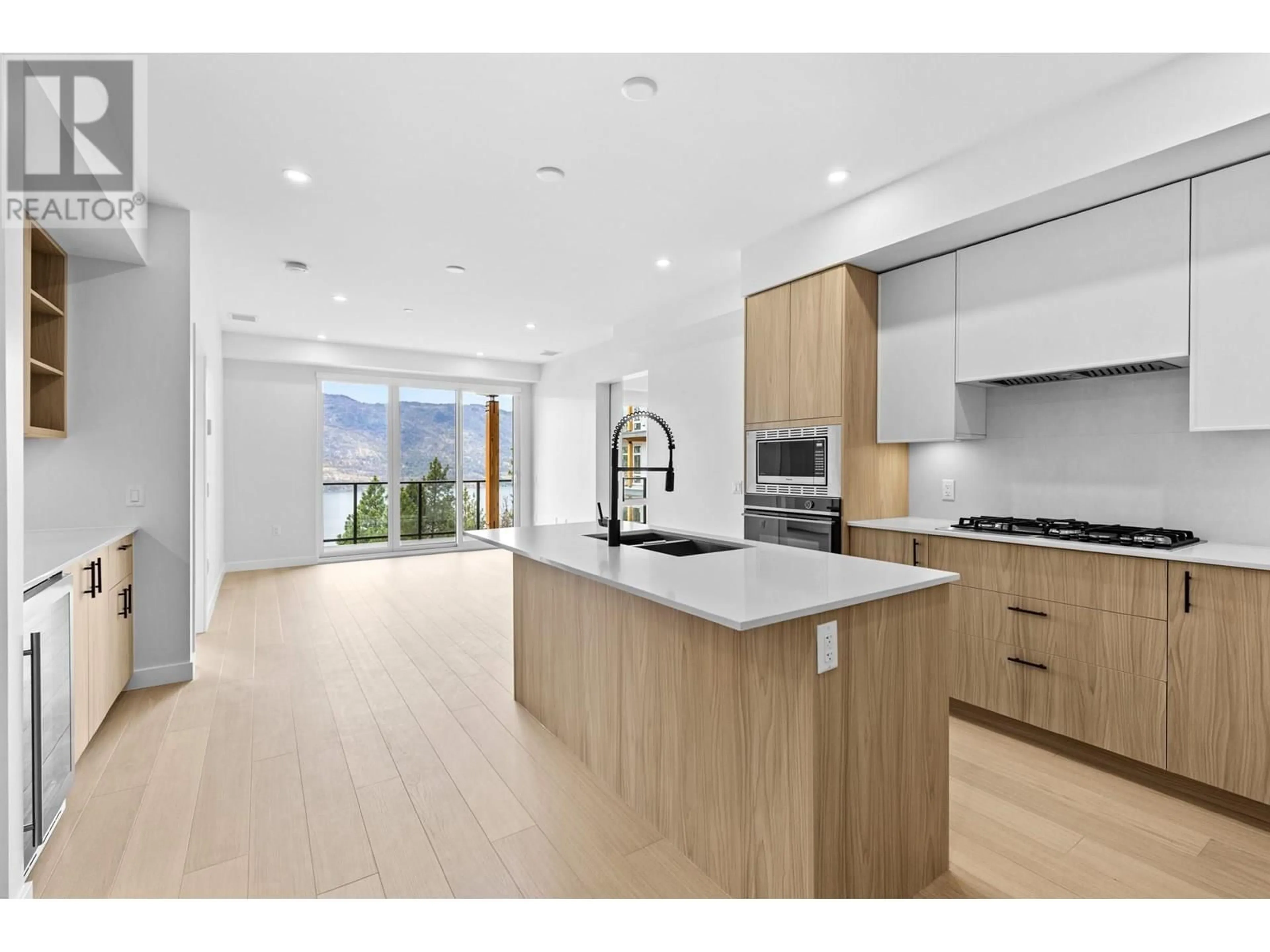 Open concept kitchen, unknown for 409 - 9654 BENCHLAND DRIVE, Lake Country British Columbia V4V1N3