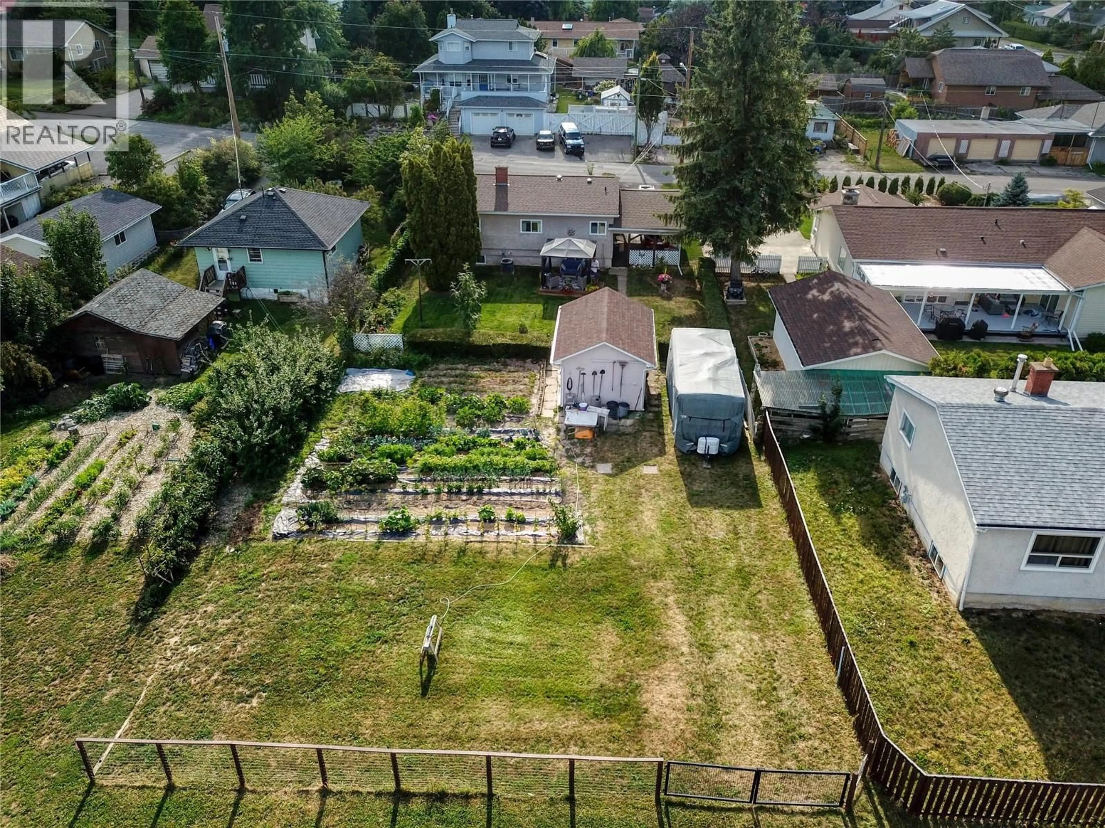A pic from outside/outdoor area/front of a property/back of a property/a pic from drone, unknown for 510 12TH AVENUE NORTH, Creston British Columbia V0B1G5