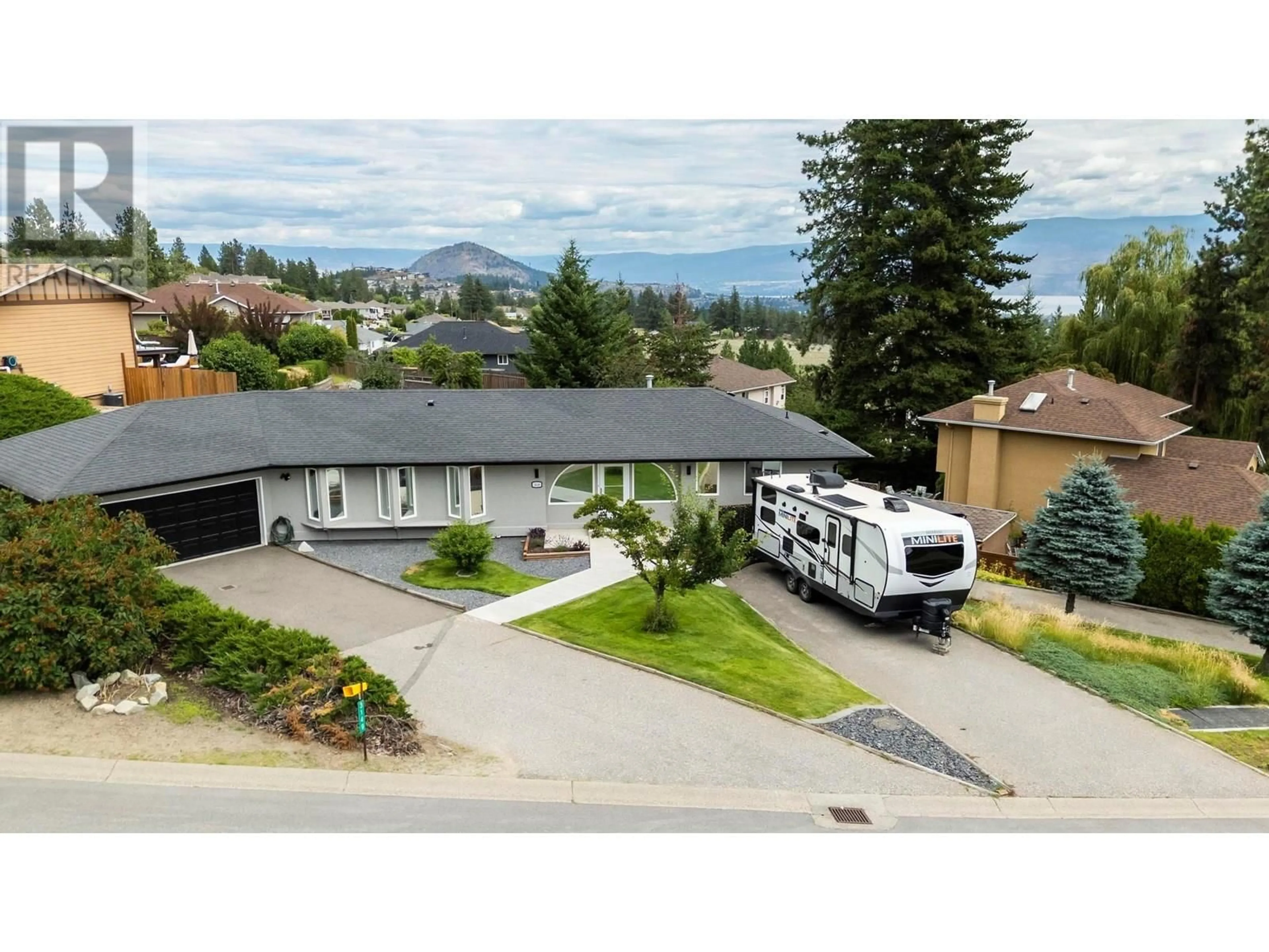 A pic from outside/outdoor area/front of a property/back of a property/a pic from drone, mountain view for 3149 SHETLER DRIVE, West Kelowna British Columbia V4T1M4